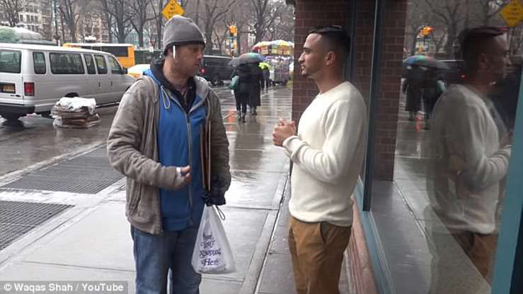 a person standing on a busy street: Shah catches up with him again and Jay shares wisdom that he was always taught to give back