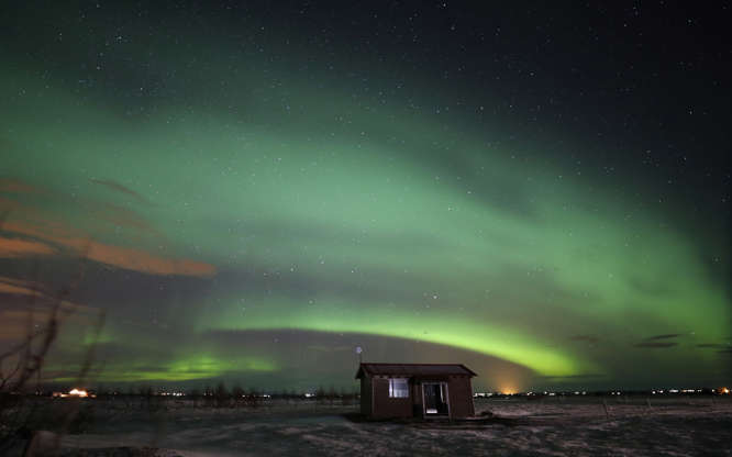 Slide 3 of 35: Aurora Borealis, or Northern Lights, over southern Iceland.