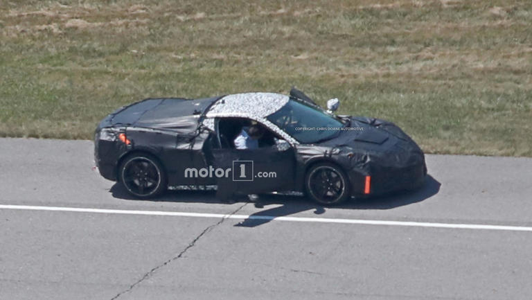 Mid-Engined Chevy Corvette Spied Waiting At A Red Light