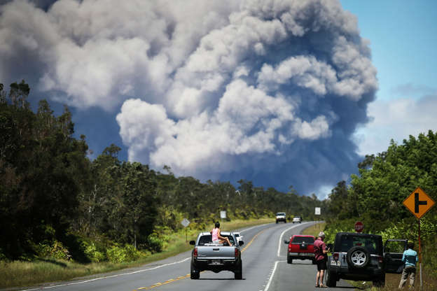 Slide 1 of 141: An ash plume rises from the Kilauea volcano on Hawaii's Big Island on May 15, 2018 in Volcano, Hawaii. The U.S. Geological Survey said a recent lowering of the lava lake at the volcano's Halemaumau crater 'has raised the potential for explosive eruptions' at the volcano.