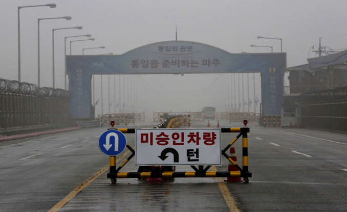 Slide 1 of 138: A barricade is placed near Unification Bridge, which leads to the demilitarized zone, near the border village of Panmunjom in Paju, South Korea, Wednesday, May 16, 2018. North Korea on Wednesday canceled a high-level meeting with South Korea and threatened to scrap a historic summit next month between U.S. President Donald Trump and North Korean leader Kim Jong Un over military exercises between Seoul and Washington that Pyongyang has long claimed are invasion rehearsals. The barricade reads: "Vehicles disapproved." (AP Photo/Ahn Young-joon)