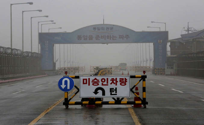 NothKoreaUSTension - Ahn Young-joon/AP Photo Slide 1 of 138: A barricade is placed near Unification Bridge, which leads to the demilitarized zone, near the border village of Panmunjom in Paju, South Korea, Wednesday, May 16, 2018. North Korea on Wednesday canceled a high-level meeting with South Korea and threatened to scrap a historic summit next month between U.S. President Donald Trump and North Korean leader Kim Jong Un over military exercises between Seoul and Washington that Pyongyang has long claimed are invasion rehearsals. The barricade reads: "Vehicles disapproved." (AP Photo/Ahn Young-joon)