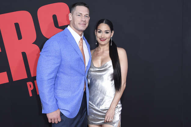 Slide 2 of 25: John Cena, left, and Nikki Bella attend the LA Premiere of "Blockers" at the Regency Village Theatre on Tuesday, April 3, 2018, in Los Angeles. (Photo by Richard Shotwell/Invision/AP)