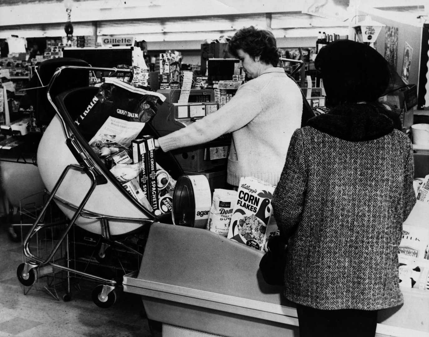 Summer 1968 - Keystone/Getty Images Slide 8 of 45: 25th August 1968: The new supermarket trolley called the 'Load-a-Matic' which can be unloaded by the cashier without help from the customer. It is being used in the USA.