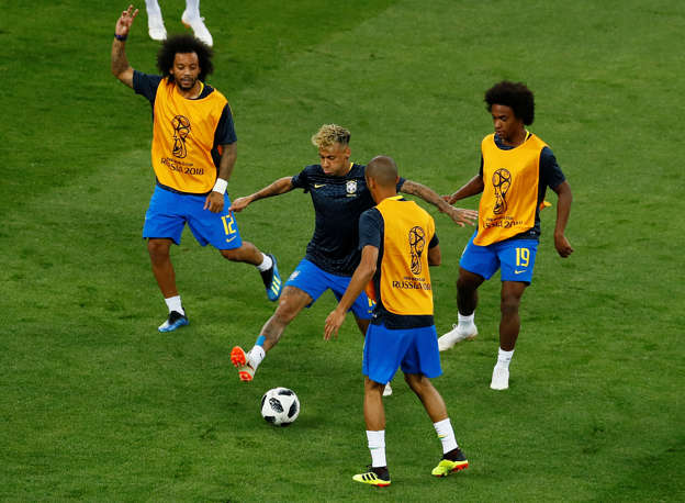Soccer Football - World Cup - Group E - Brazil vs Switzerland - Rostov Arena, Rostov-on-Don, Russia - June 17, 2018   Brazil's Neymar, Marcelo and Willian warm up before the match   REUTERS/Jason Cairnduff