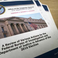 The 568-page report by U.S. Department of Justice Inspector General Michael Horowitz entitled “A Review of Various Actions by the Federal Bureau of Investigation and Department of Justice in Advance of the 2016 Election” is seen shortly after its release in Washington, U.S. June 14, 2018.