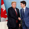 U.S. President Donald Trump shakes hands with Canada’s Prime Minister Justin Trudeau in a bilateral meeting at the G7 Summit in in Charlevoix, Quebec, Canada, June 8, 2018.