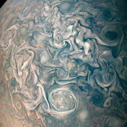 This image captures swirling cloud belts and tumultuous vortices within Jupiter’s northern hemispher... - NASA/JPL-Caltech/SwRI/MSSS/Gerald Eichstädt /Seán Doran Slide 4 of 86: NASA’s Juno spacecraft took this color-enhanced image at 10:23 p.m. PDT on May 23, 2018 (1:23 a.m. EDT on May 24), as the spacecraft performed its 13th close flyby of Jupiter. At the time, Juno was about 9,600 miles (15,500 kilometers) from the planet's cloud tops, above a northern latitude of 56 degrees.