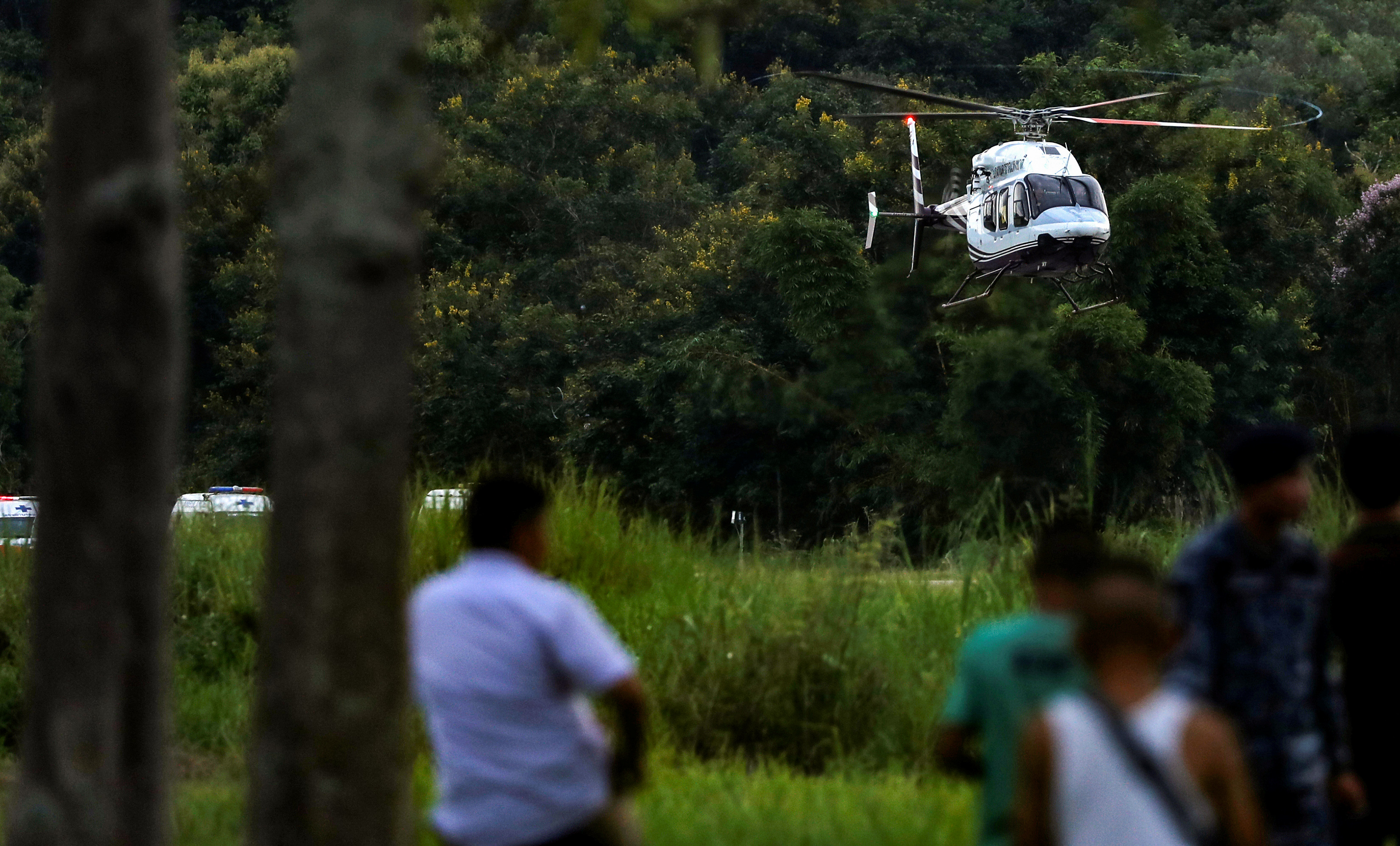 Slide 2 of 84: A helicopter carrying rescued schoolboys lands at a military airport in Chiang Rai, Thailand, July 10, 2018.