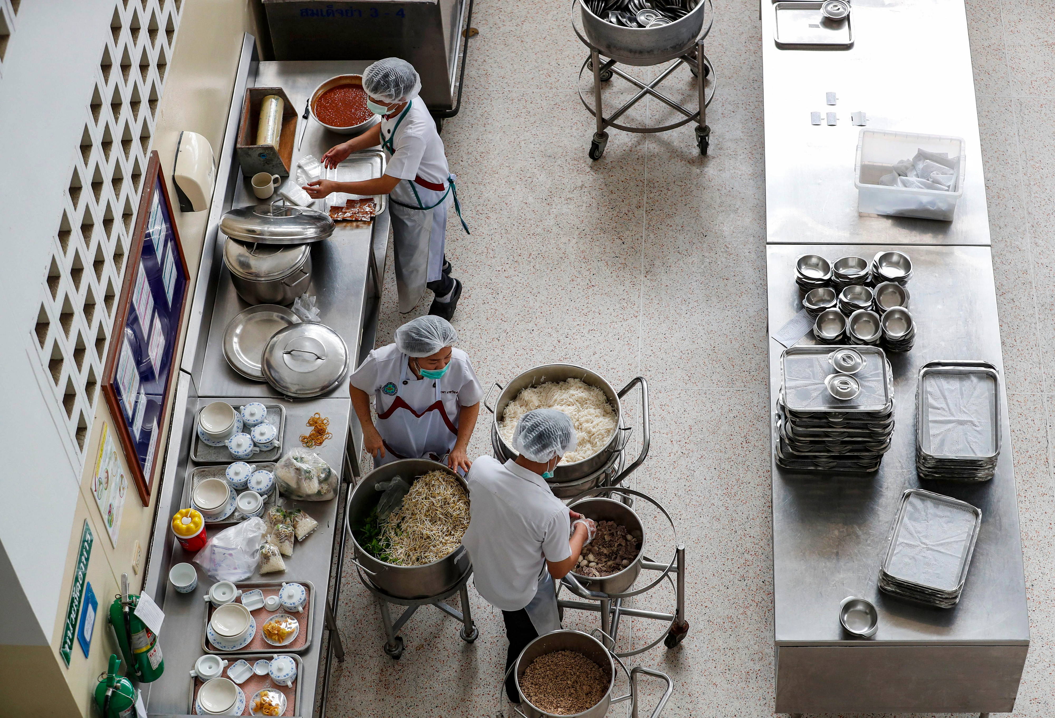 Slide 4 of 84: Thai nutritionists prepare foods at Chiangrai Prachanukroh Hospital, where eight boys of a soccer team are staying after they were rescued from Tham Luang cave in Chiang Rai province, Thailand, 10 July 2018. According to reports, eight boys have made it to safety as rescue operations continue for the remaining members of a youth soccer team, including their assistant coach, who have been trapped in Tham Luang cave since 23 June 2018. Some members of a trapped Thai soccer team have been rescued, Chiang Rai, Thailand - 10 Jul 2018