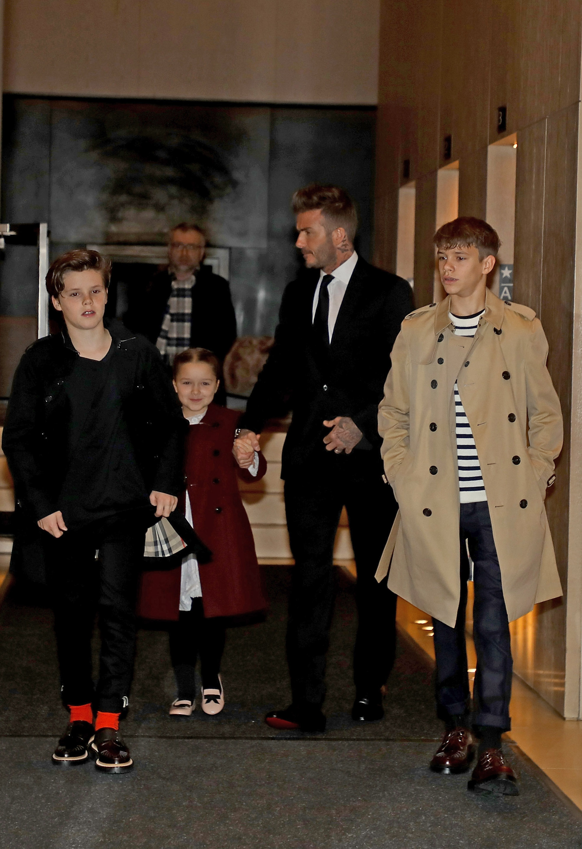 Slide 5 of 38: NEW YORK, NY - FEBRUARY 11:  David Beckham and his children Harper, Cruz and Romeo leave their hotel to attend the Victoria Beckham show on February 11, 2018 in New York City.  (Photo by Pierre Suu/GC Images)