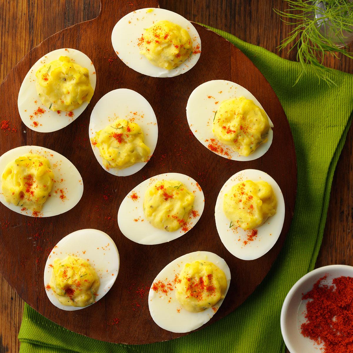 People say, "Wow!" when they taste these flavorful tangy deviled eggs. The bold combination of ground mustard, dill and horseradish is so appealing. The plate is always emptied whenever I serve these eggs. —Ruth Roth, Linville, North Carolina <a href="https://www.tasteofhome.com/recipes/horseradish-deviled-eggs/">Get Recipe</a>