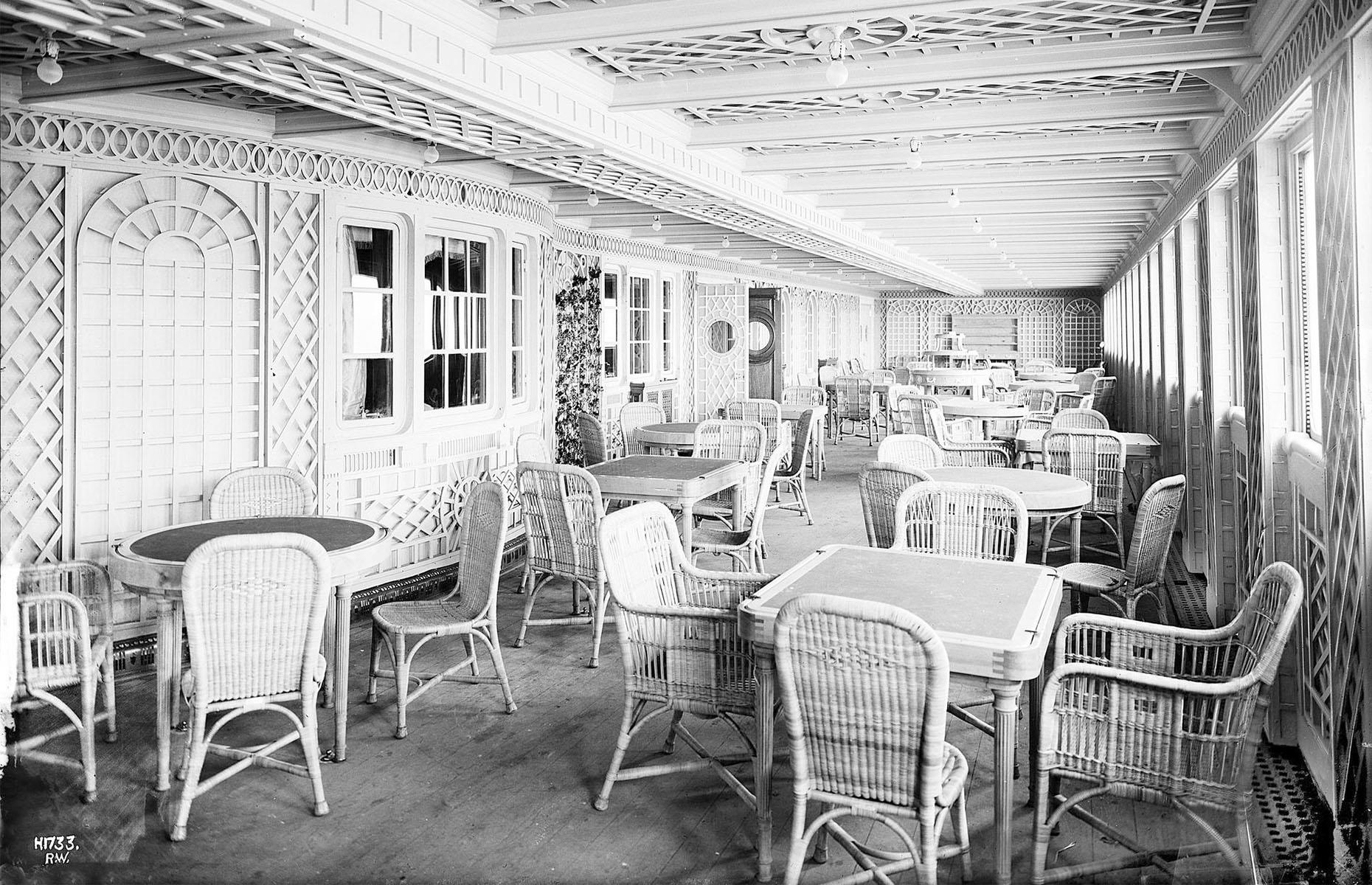 As well as the dining saloon and luxurious à la carte restaurant first-class passengers had other places to eat including the Veranda Café, and the Café Parisien (pictured). Both had wicker chairs and ivy colored trellises, the former resembled an outdoor terrace of a country hotel and the latter a café on a Parisian sidewalk, despite being completely enclosed.