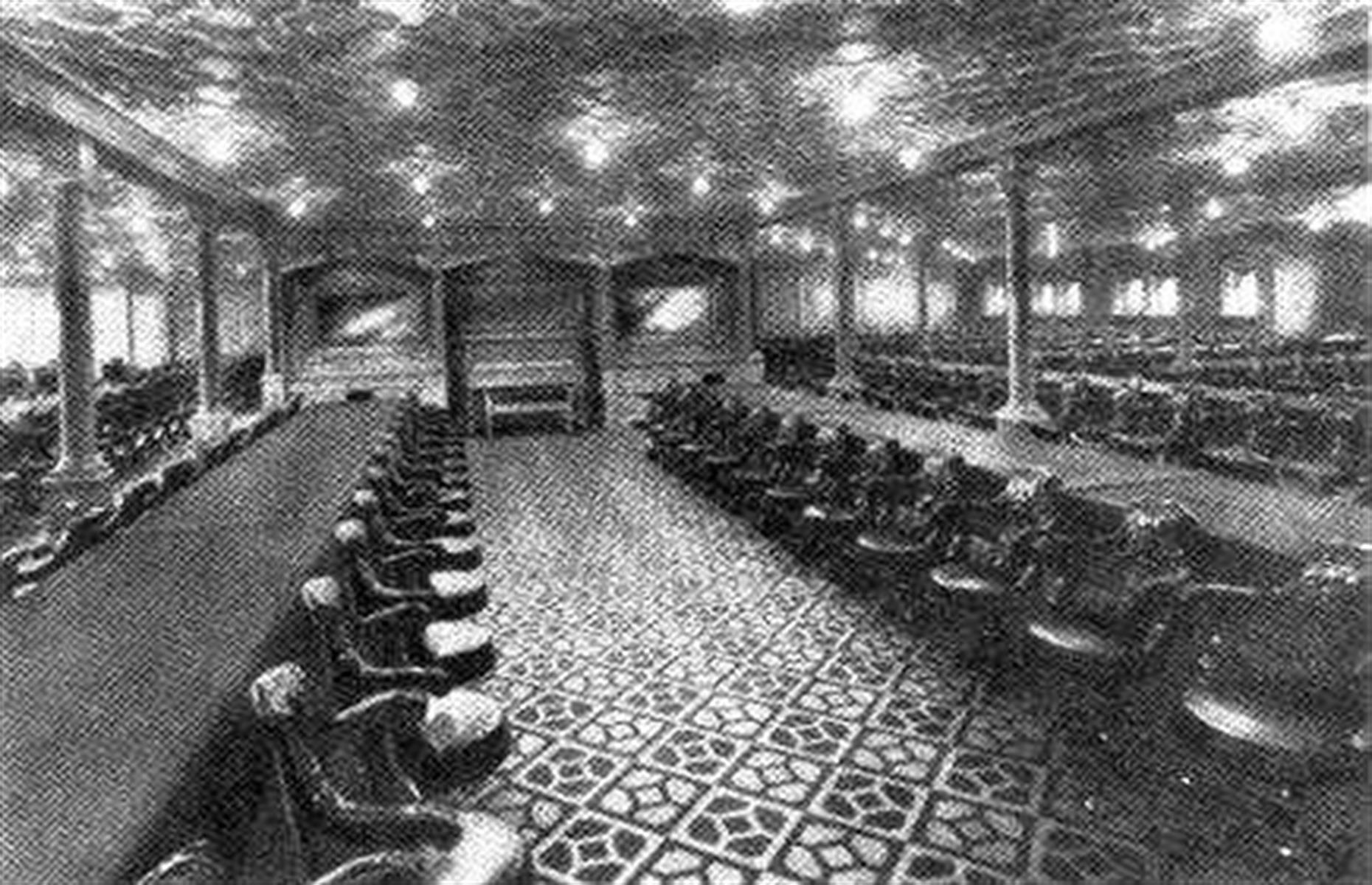 While not as grand as first-class dining facilities, the second-class dining room was still a sight to behold. It was an attractive space big enough to seat all second-class passengers, with oak-paneled walls, colored linoleum floors, long tables and mahogany swivel chairs. Pictured here is the second-class dining room on the Olympic.