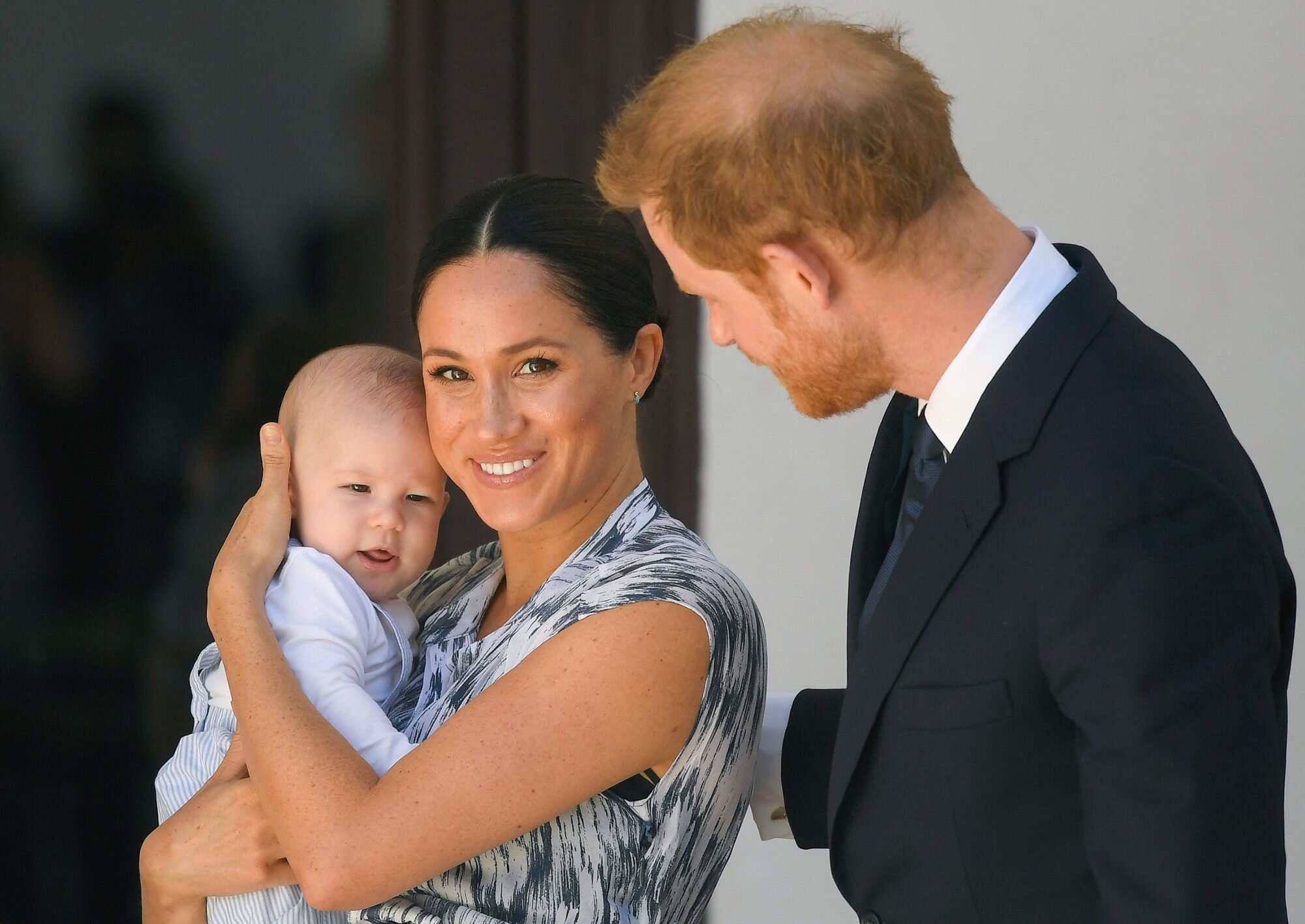 Meghan Markle in a suit and tie: Samir Hussein/WireImage Archie, Meghan Markle and Prince Harry
