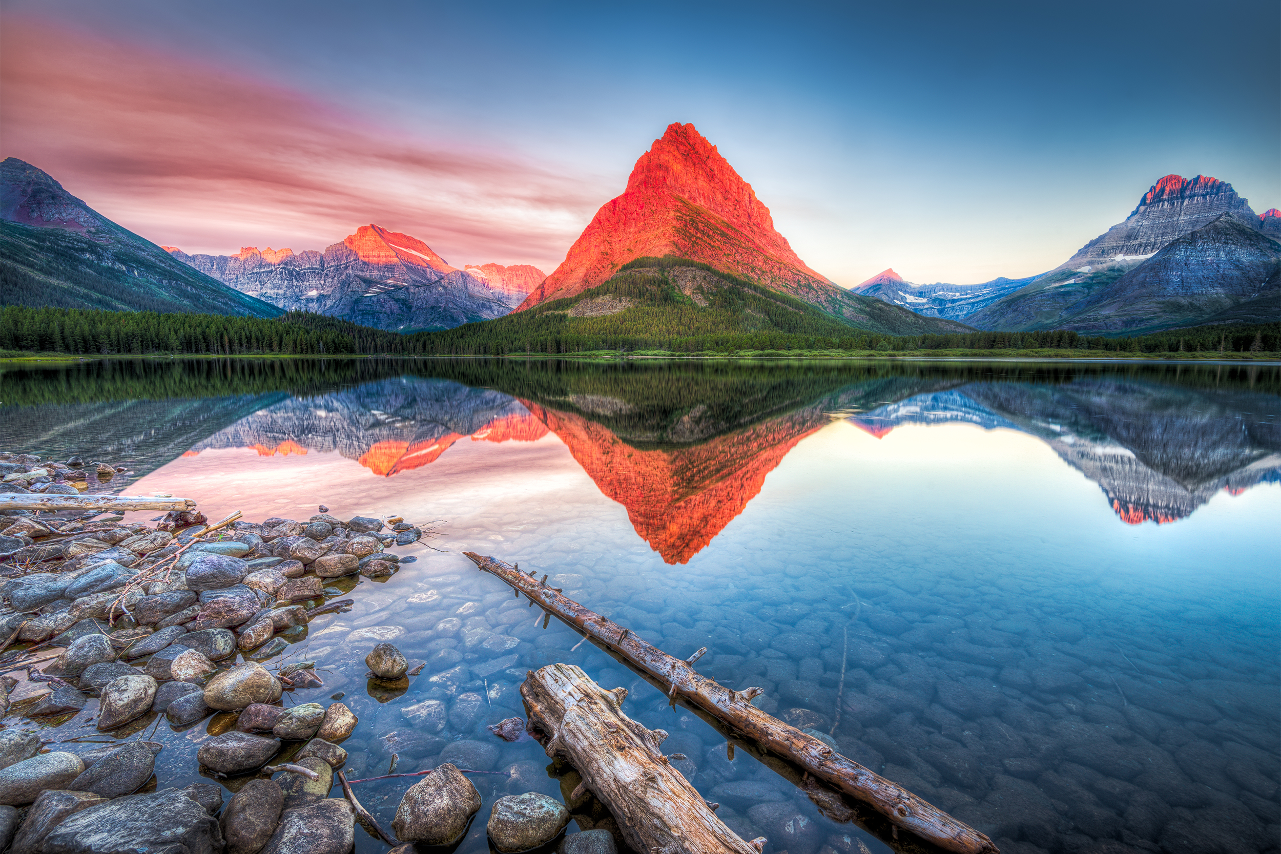 <p>The United States is home to <a href="https://blog.cheapism.com/best-national-parks-to-visit-14142/">62 stunning national parks</a> spread over 29 states. The oldest, Yellowstone National Park, was created by Ulysses S. Grant in 1872. The most recent addition, White Sands National Park, located in New Mexico, joined the club in December 2019. Each of the 60-plus parks offers uniquely awe-inspiring wild places. Individually and collectively, they represent the best of America’s natural beauty, and offer visitors both a place for spiritual renewal and the chance to get lost in the splendor of the great outdoors. Even when we can't visit the parks in person, we can still enjoy stunning photos of them from afar. (Curious to see what our parks looked like decades ago? Be sure to check out <a href="https://blog.cheapism.com/vintage-national-park-photos/">33 Historic National Park Photos for Vintage Views</a>.)</p>