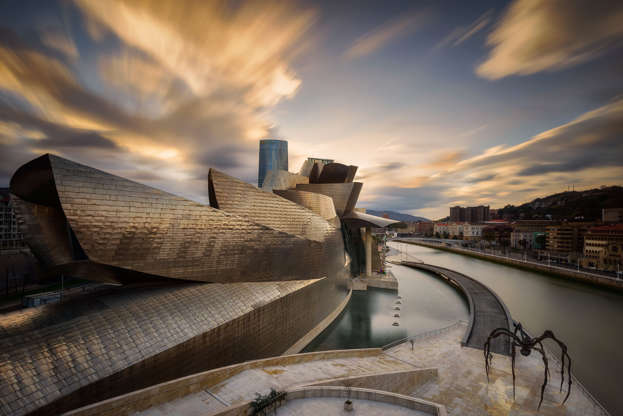 Slide 31 de 65: February 9th, 2014 - View of the Guggenheim museum in Bilbao, Spain, while an epic sunset as background is taking place. The building was built by Ferrovial and designed by Canadian-American architect Frank Gehry.