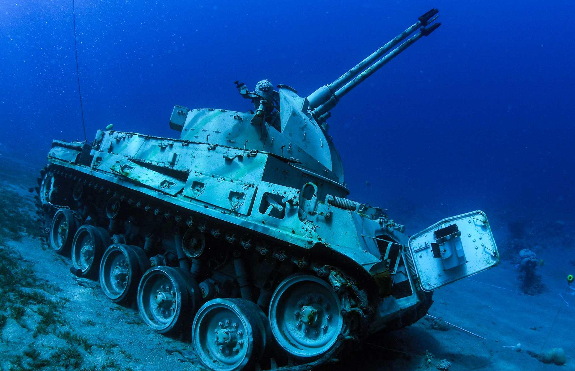 Slide 4 of 31: Just off the coast of Aqaba on Jordan’s Red Sea coast is a surprising collection of military hardware. Tanks, a helicopter and a troop carrier have been sunk and arranged to mimic a battle formation. Lying 50 to 90 feet (15-28m) below the surface the museum opened in July 2019 and usually welcomes both divers and snorkelers. Much care was taken not to disturb marine life during the construction, with any hazardous material and chemicals removed.