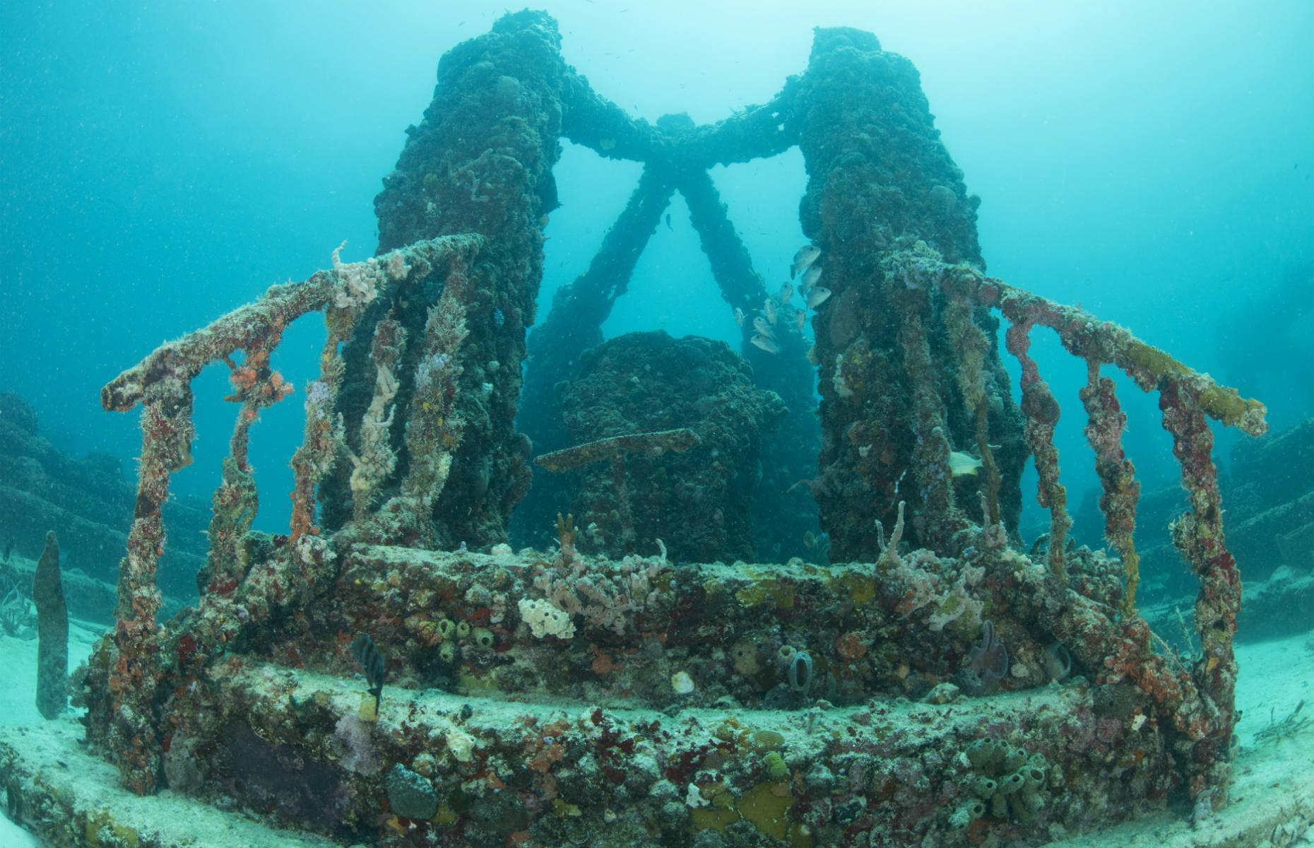 Slide 18 of 31: This underwater cemetery lies just off Florida’s Key Biscayne. Around 40 feet (12m) below the water's surface, the structures have been modeled on Atlantis, complete with a majestic entrance guarded by lions. The cemetery is still expanding, initially holding 850 “placements” (cremated remains mixed with concrete molded into marine shapes) with plans to eventually cover 16 acres of once-barren ocean floor, transforming it into the largest ever man-made reef.