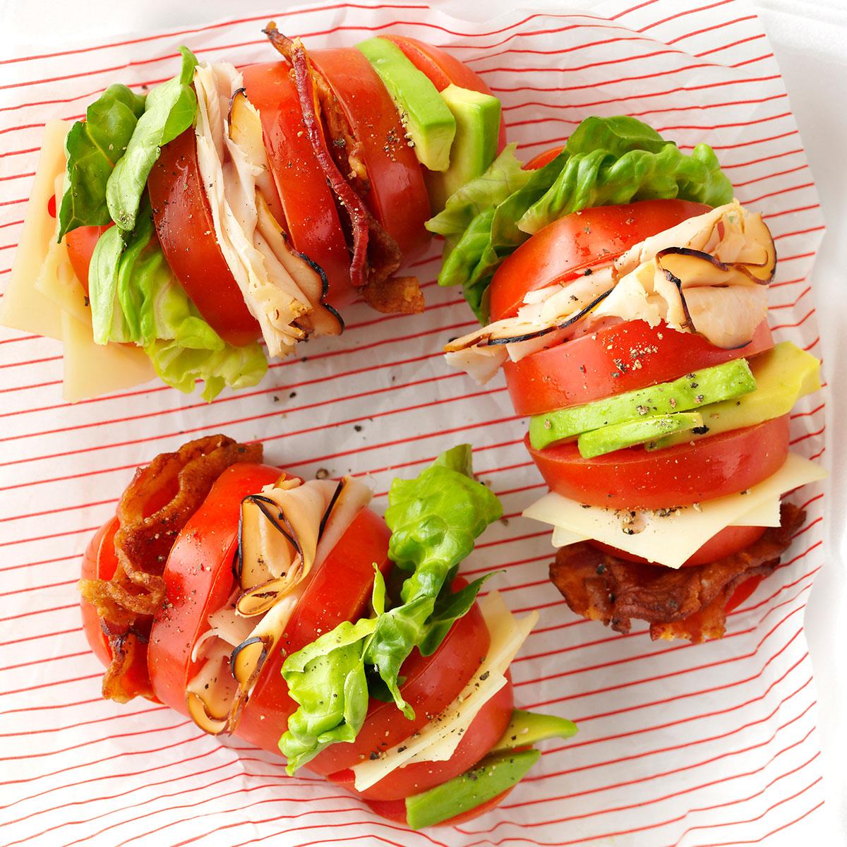 This no-fuss, no-bread riff on a classic is perfect during tomato season. Make it for lunch or pair with pasta salad for a light dinner. —Taste of Home Test Kitchen, Milwaukee, Wisconsin <a href="https://www.tasteofhome.com/recipes/hasselback-tomato-clubs/">Get Recipe</a>
