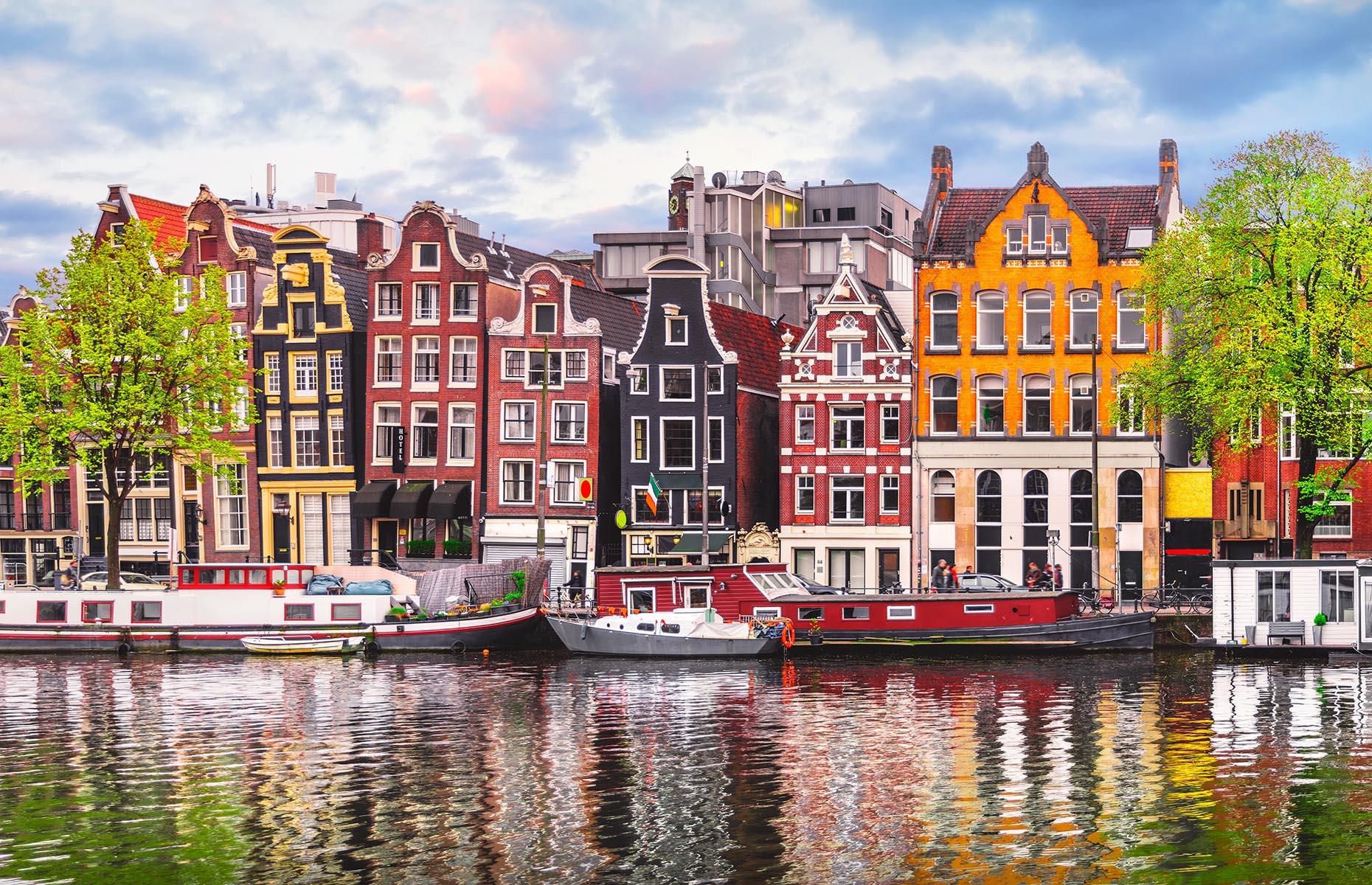 <p>The Dutch capital conjures images of tightly packed gabled houses lining the city's network of canals and cyclists who rule the streets. <a href="http://www.loveexploring.com/guides/85437/explore-amsterdam-top-things-to-see-and-do-best-hotels-and-where-to-eat">Amsterdam</a> oozes a cool, modern vibe. The food scene is top-notch, ranging from beer bars to upscale dining experiences. The city is also home to one of Europe's most celebrated museums – the Rijksmuseum. Now take a look at <a href="https://www.loveexploring.com/galleries/94624/stunning-images-of-europes-most-adorable-small-towns-and-villages">Europe's most adorable small towns and villages</a>.</p>