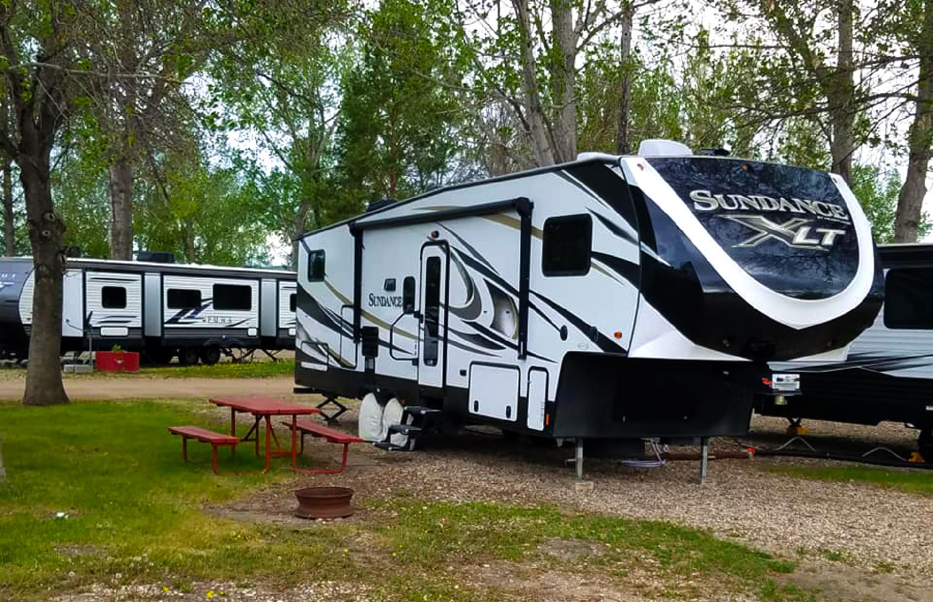 <p>They're a friendly bunch at the <a href="https://www.roughriderrvresort.com/">Roughrider RV Resort and Campground</a>. Touted as the place "Where Land and Sky Meet the Great Plains", the family-owned park has more than 100 RV sites dotted across its grounds – many have full hook-ups, and both pull-through and back-in sites are available. Hemmed in by forestland, it's right by the Souris River and close to the city of Minot, known for its Scandinavian heritage and aviation history. <a href="https://www.loveexploring.com/gallerylist/86053/these-american-destinations-feel-like-youre-visiting-another-country">Check out these American destinations that feel like you're visiting a different country</a>.</p>