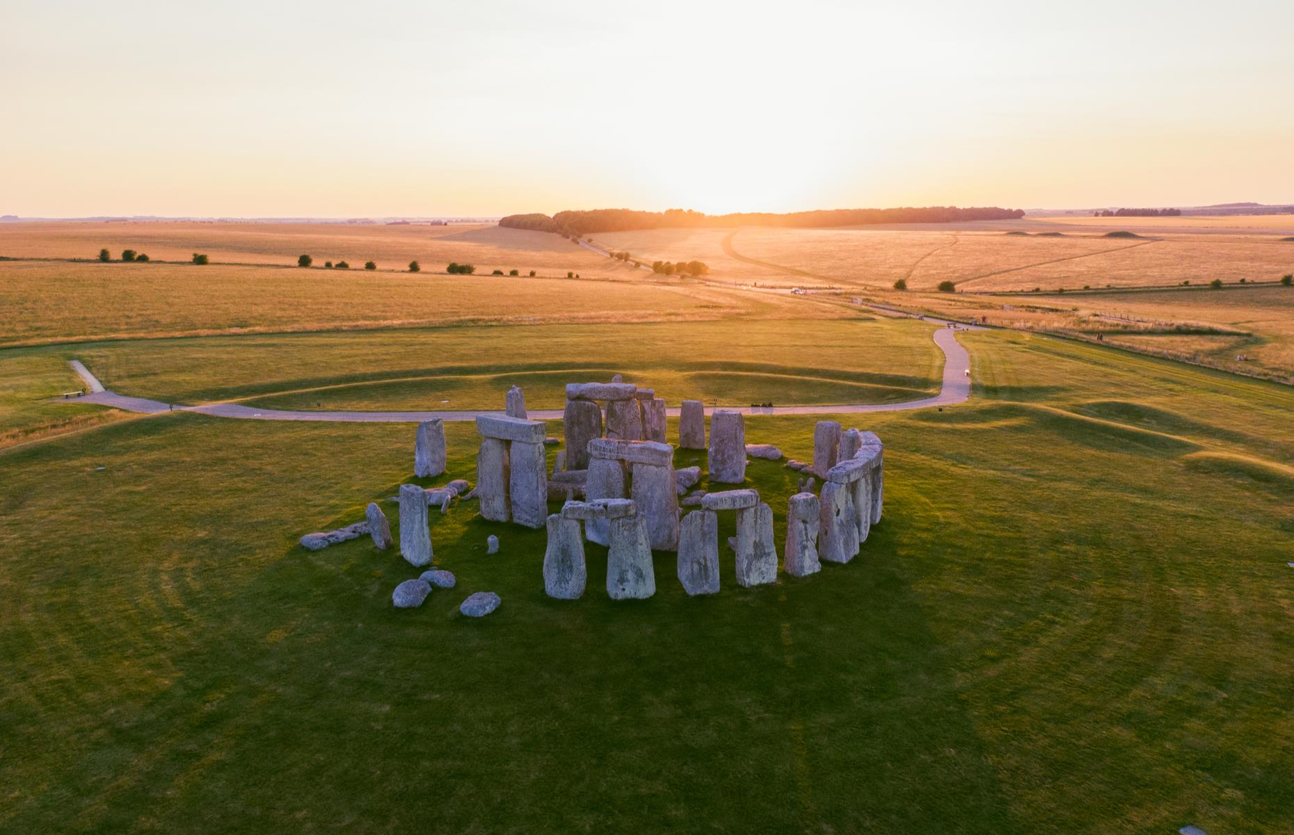 Slide 2 of 31: No matter how many times you gaze upon the mighty circle of stones rising from the Salisbury Plain, you'll always be awestruck by them. The most famous prehistoric monument in Europe, Stonehenge was erected in the late Neolithic period in around 2500 BC and is now part of an UNESCO World Heritage Site along with nearby Avebury. The mystery of how and why the enormous sarsen stones and smaller bluestones were transported all the way from Pembrokeshire and erected here has fascinated people for centuries.