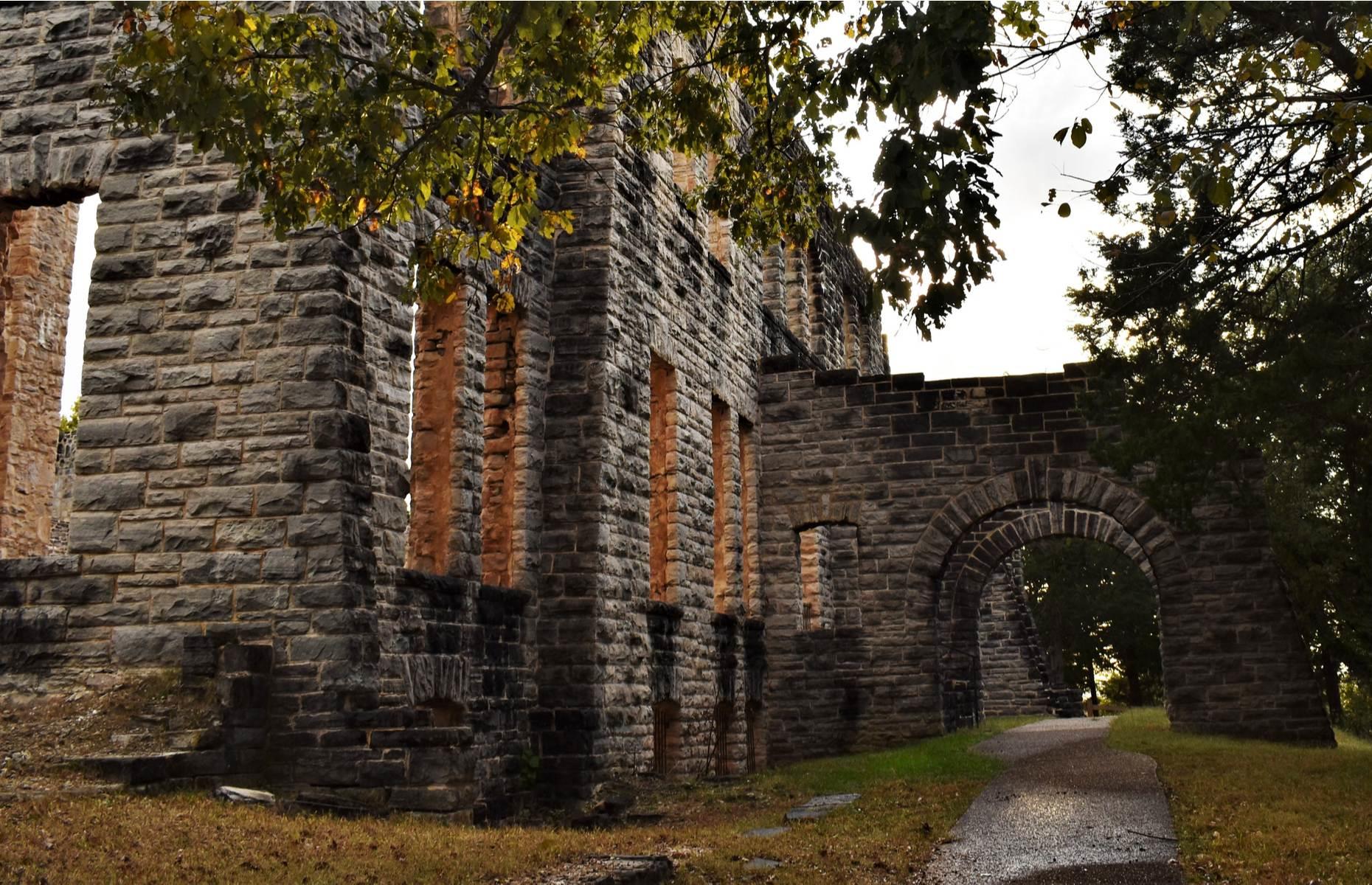 Slide 9 of 29: However, in the late 1970s, the state of Missouri bought the land and today the ghostly ruin has become a tourist attraction and a site for hiking and nature walks. Find more spectacular American castles you never knew existed here.