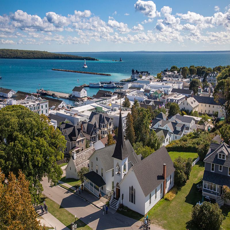 <p>If you're the sort of person who prefers quaint B&Bs over large scale hotels, Mackinac Island is the place for you. The town, which does not allow cars, requires visitors to travel by foot, bike, or horse and buggy. </p>