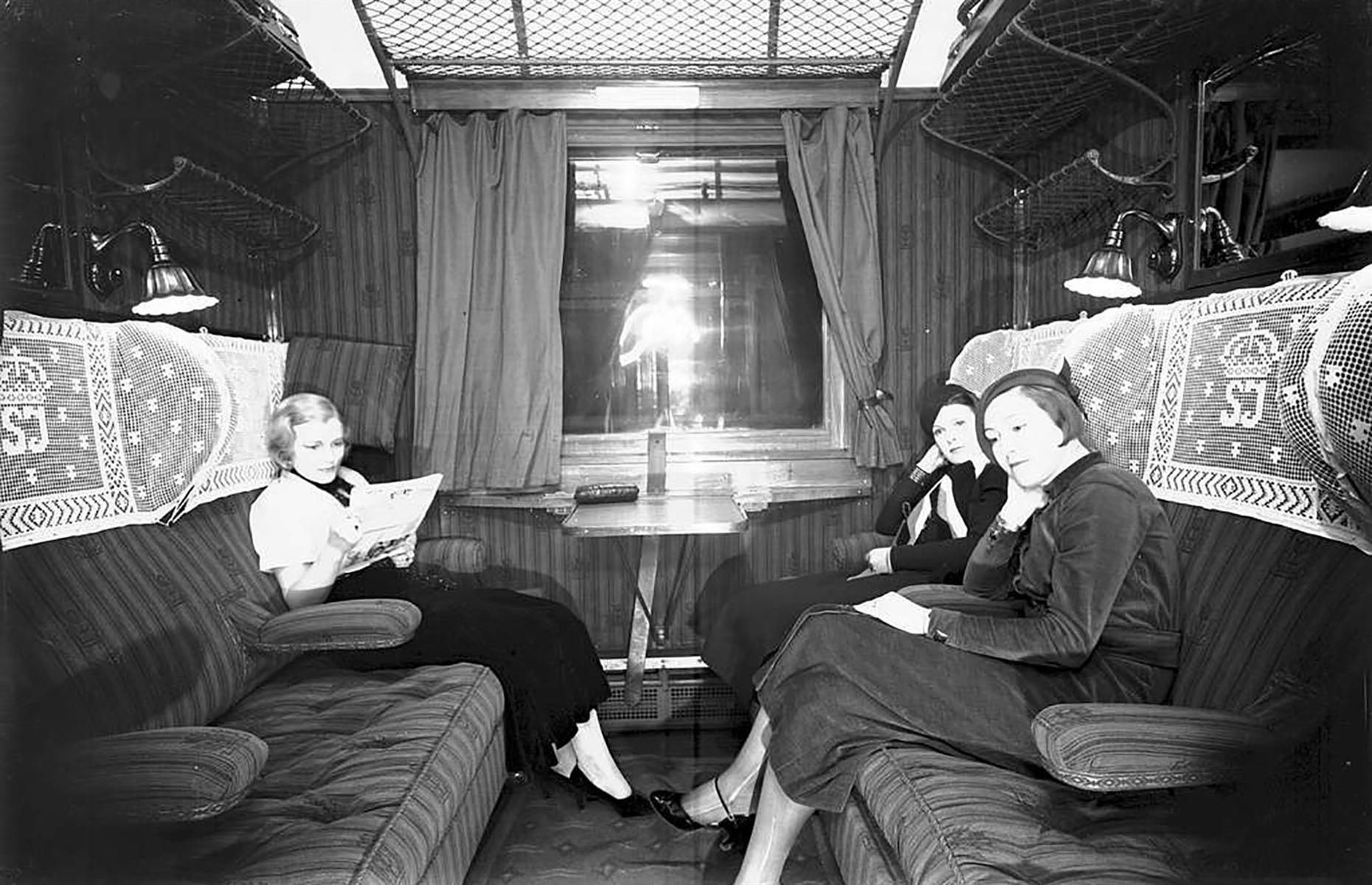 This image shows that travelling in second class was still very comfortable in some state-operated trains like Sweden. The SJ on the embroidered head rest covers stands for Statens Järnvägar – Swedish for Swedish State Railways.