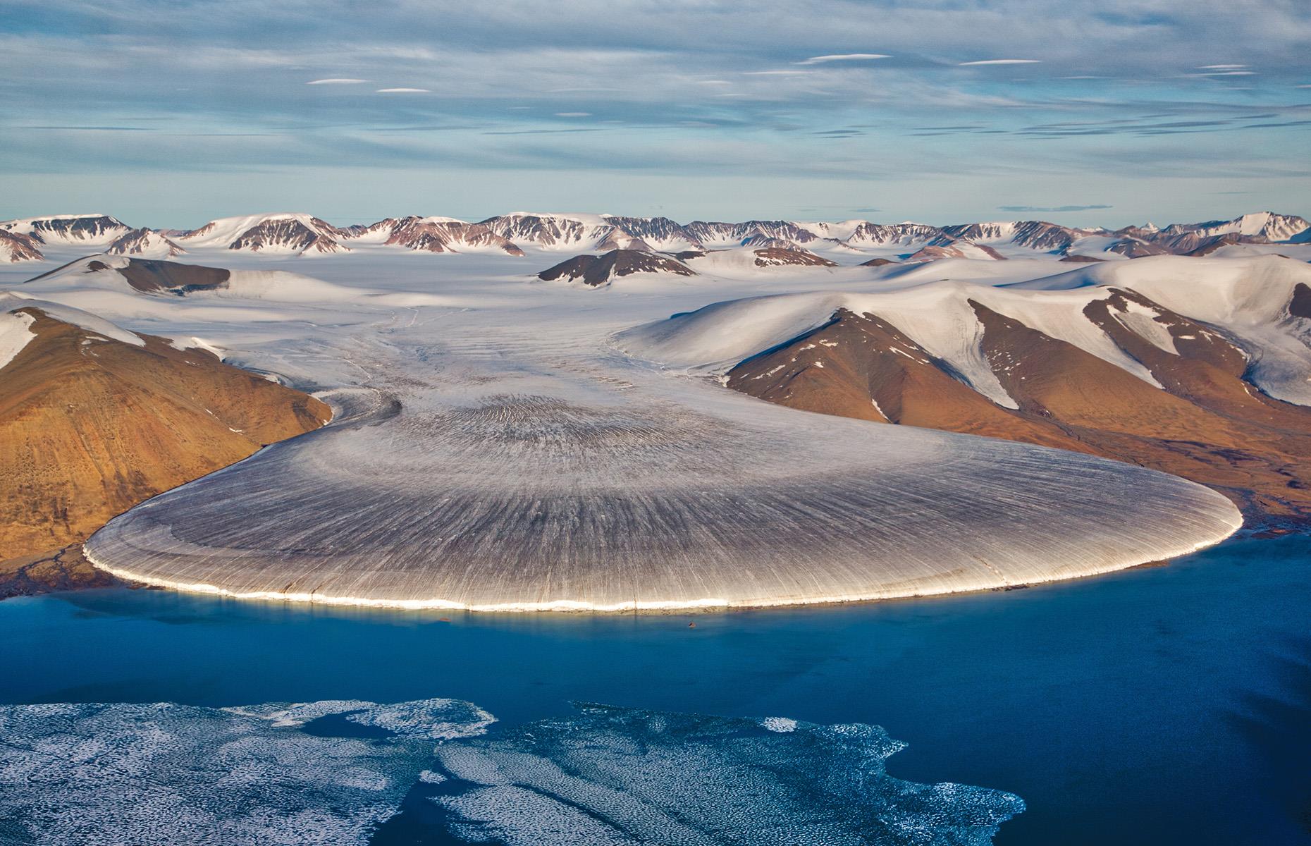 Slide 7 of 44: Part of the Kingdom of Denmark, Greenland is still one of the least-visited nations in Europe. Just over 100,000 people explored this stunning land of glaciers and mountains in 2018, compared with well over two million visitors to neighboring Iceland the year before.