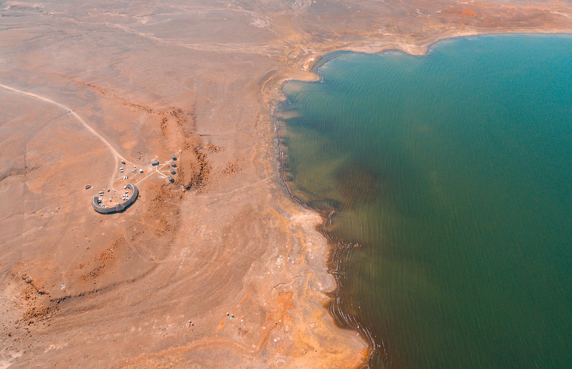 Slide 34 of 44: Far in the northwestern corner of Kenya, surrounded by desert, Lake Turkana is seriously remote. The roads leading here have no asphalt, and conditions on the rocky tracks are so bad even truck tires can burst on the drive up.