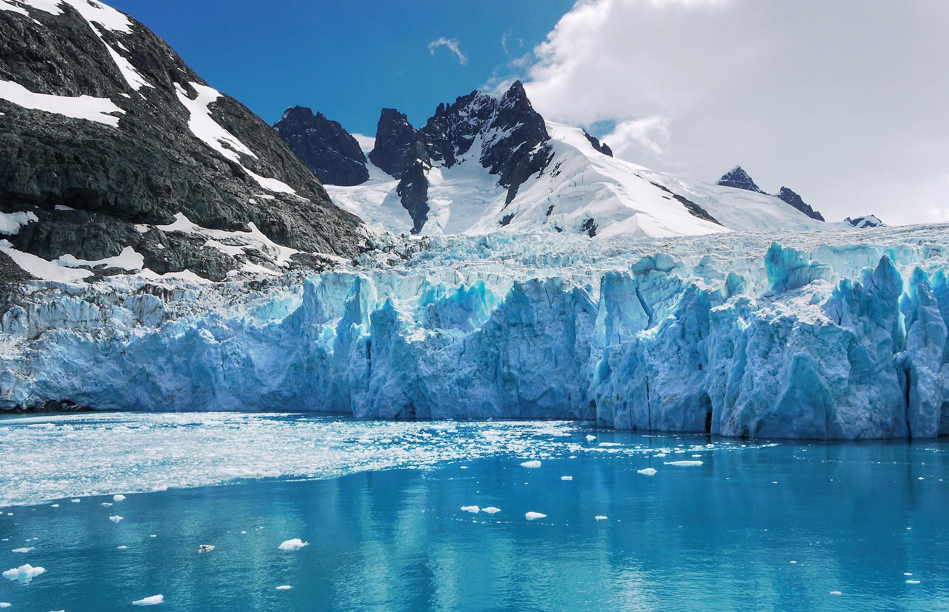 Slide 13 of 44: With no airport and a location hundreds of miles east of the tip of South America, this island, stranded out in the Atlantic Ocean, is only accessible by boat. Just over 17,000 people stopped on the shores of South Georgia Island between 2017 and 2018, and that included cruise ship staff and scientific researchers.