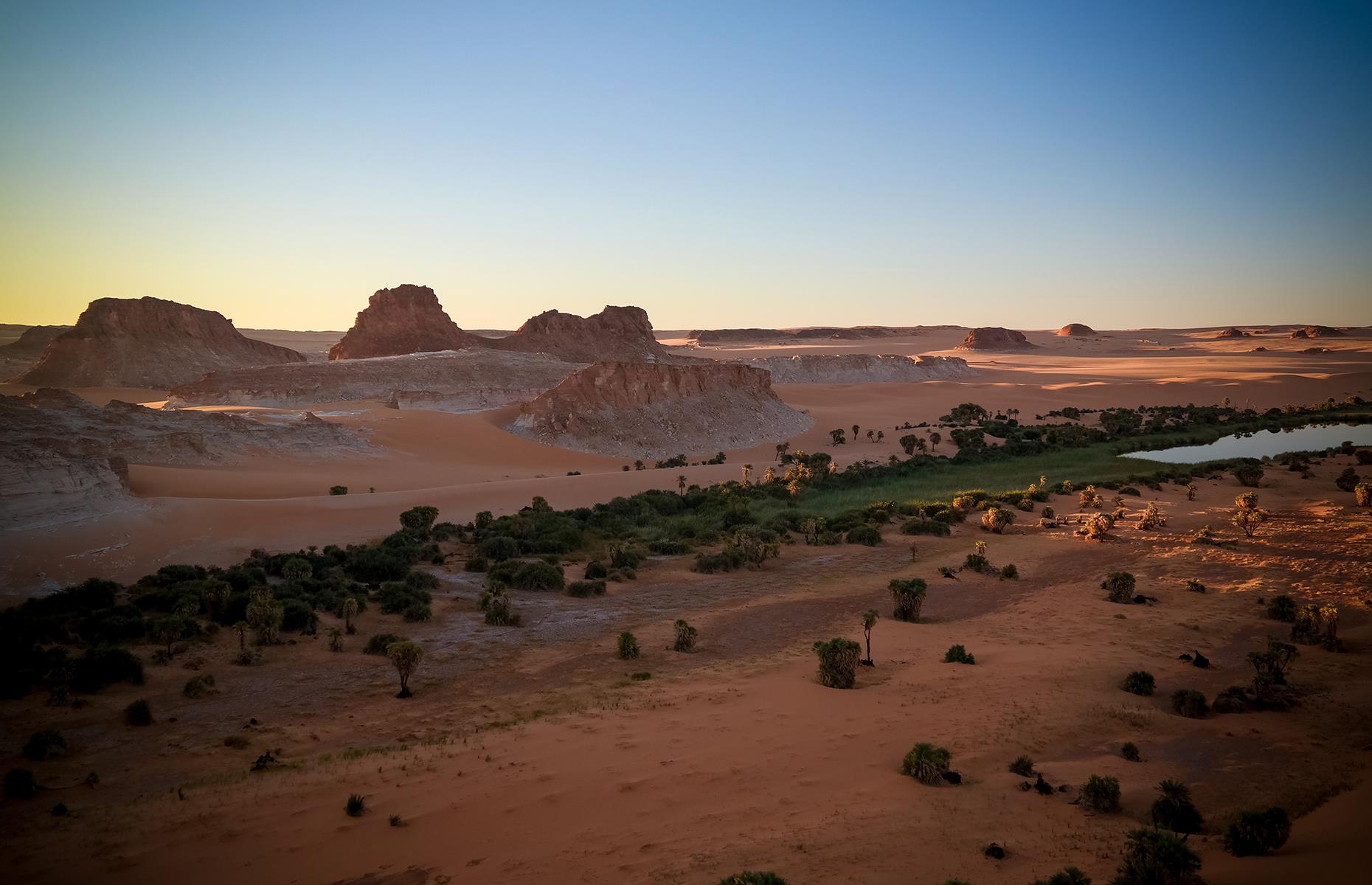 Slide 29 of 44: This desert oasis is a rarely visited natural wonder. The Ennedi Plateau in northeastern Chad is essentially off limits to tourists, and few locals will go there too due to its proximity to Libya and Sudan.