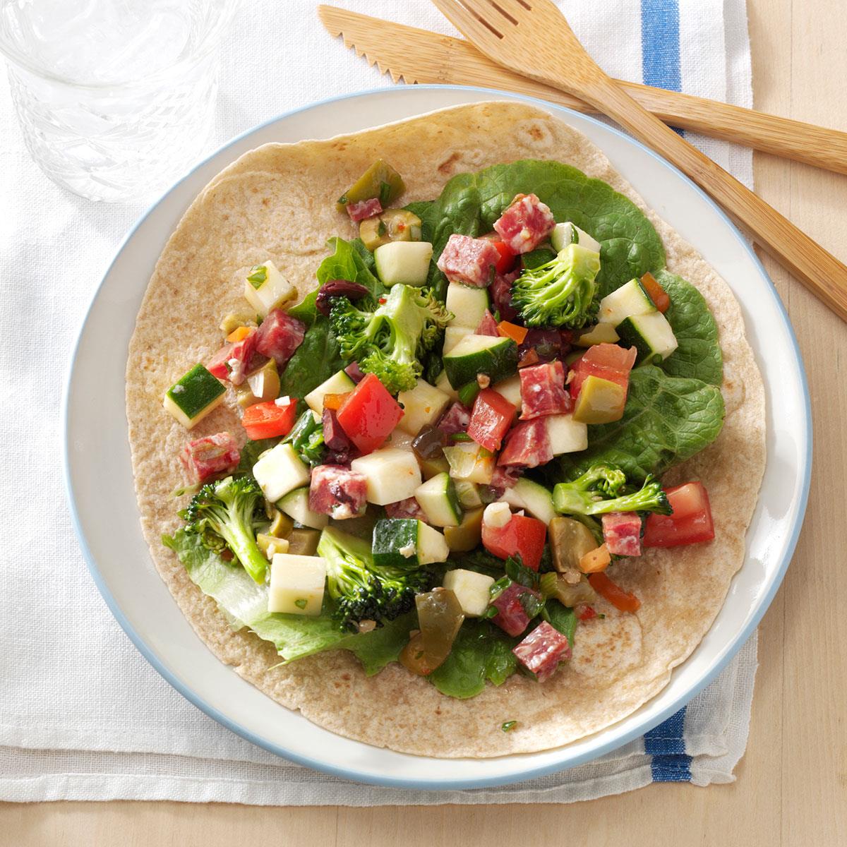 Yummy! There are so many great flavors and textures in these wraps. Feel free to experiment with the ingredients—use mozzarella, pepperoni or any combo you like. —Maria Simmons, Rio Rancho, New Mexico <a href="https://www.tasteofhome.com/recipes/italian-style-veggie-wraps/">Get Recipe</a>