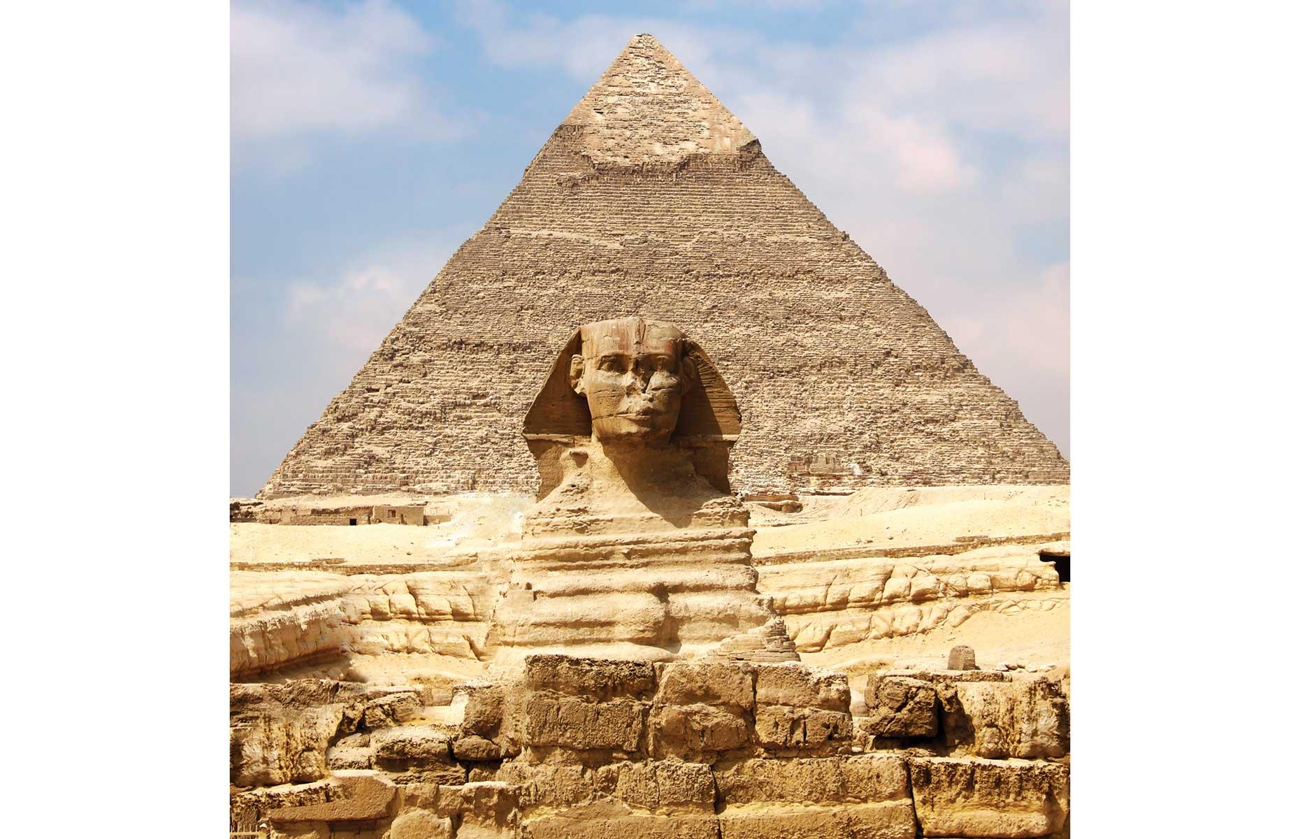 Slide 3 of 14: The second largest of the pyramids on the Giza plateau was built for King Khaefre (2558–2532 BC), son of King Khufu, the visionary behind the Great Pyramid. This impressive structure gives a clear idea of how an ancient Egyptian pyramid was built. The bulk of the structure was composed of locally quarried limestone and then finished with fine, white, polished Tura limestone from quarries across the Nile as seen here at the top of the pyramid.
