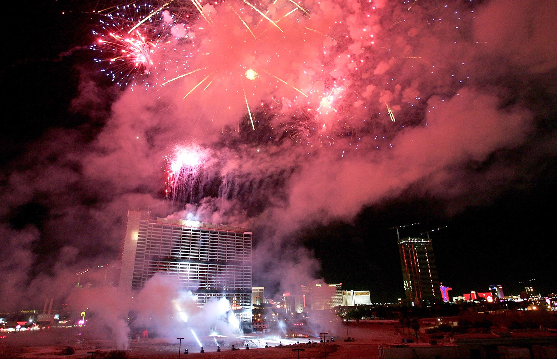 Slide 13 of 31: The Stardust closed its doors at the end of 2006 but it went out with a bang. This shot shows fireworks glittering over the hotel as it is imploded in 2007 to make way for a new development. Resorts World Las Vegas is currently being constructed on the site and is slated to be finished by 2021.