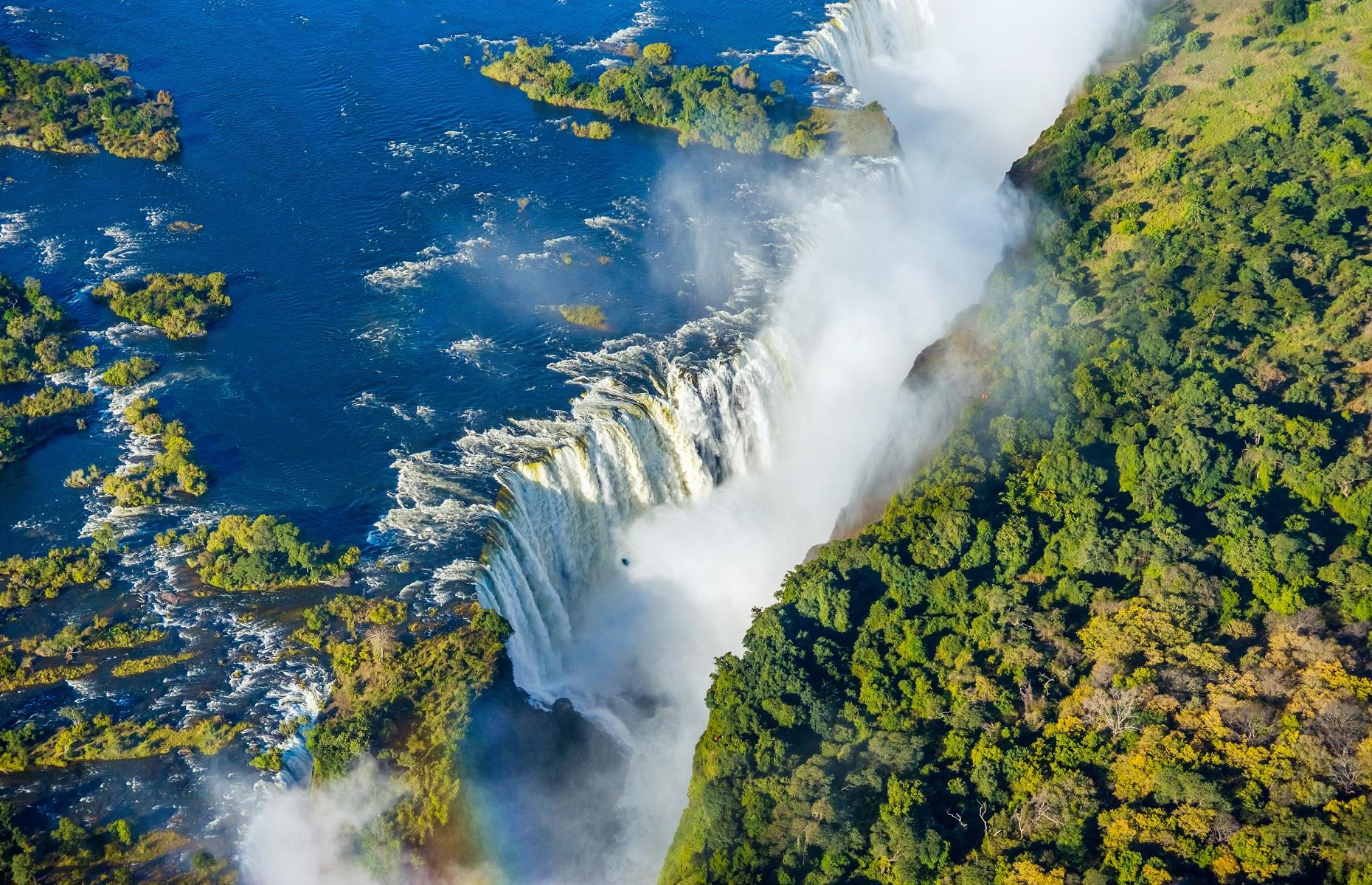 Slide 34 of 59: As the fourth-longest river in the whole of Africa, the Zambezi is a true spectacle of Mother Nature. Stretching for more than 1,550 miles (2,500km), the river weaves through Zambia, Zimbabwe, Mozambique, Angola, Namibia and Botswana until it reaches the Indian Ocean. With unrivaled natural scenery and some of the world's most attractive waterfalls, the Zambezi is also the home of the iconic Victoria Falls.