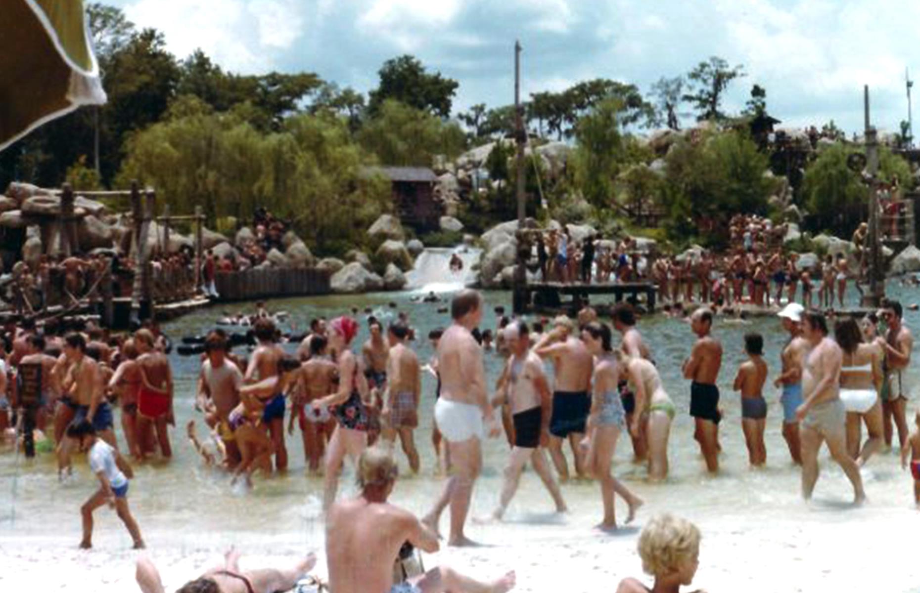 Slide 24 of 31: The creepy remains of Disney’s River County still exist in Florida’s Bay Lake (pictured here in 1977). Walt Disney World Resort’s earliest water park opened in 1976, drawing visitors in their thousands with its slides rushing over rocks and its large swimming hole. The park was well-loved over the decades, but a handful of tragedies were linked to the site: two children died from drowning in the 1980s and another from a fatal amoebic infection contracted from the water.