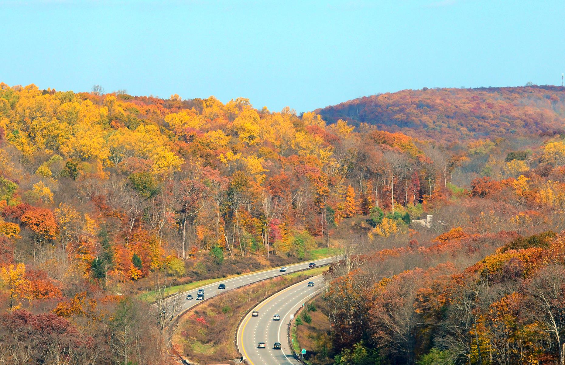 <p>A road trip from New York City up to Lake George in the Adirondack Mountains is a top way to escape the Big Apple's buzz for a weekend. It’s a longer trip at more than 200 miles (322km), and involves just under four hours on the Taconic State Parkway (pictured) and I-87 (the Adirondack Northway). But, in the fall, spectacular views of forests and peaks more than make up for the extra time on the road.</p>