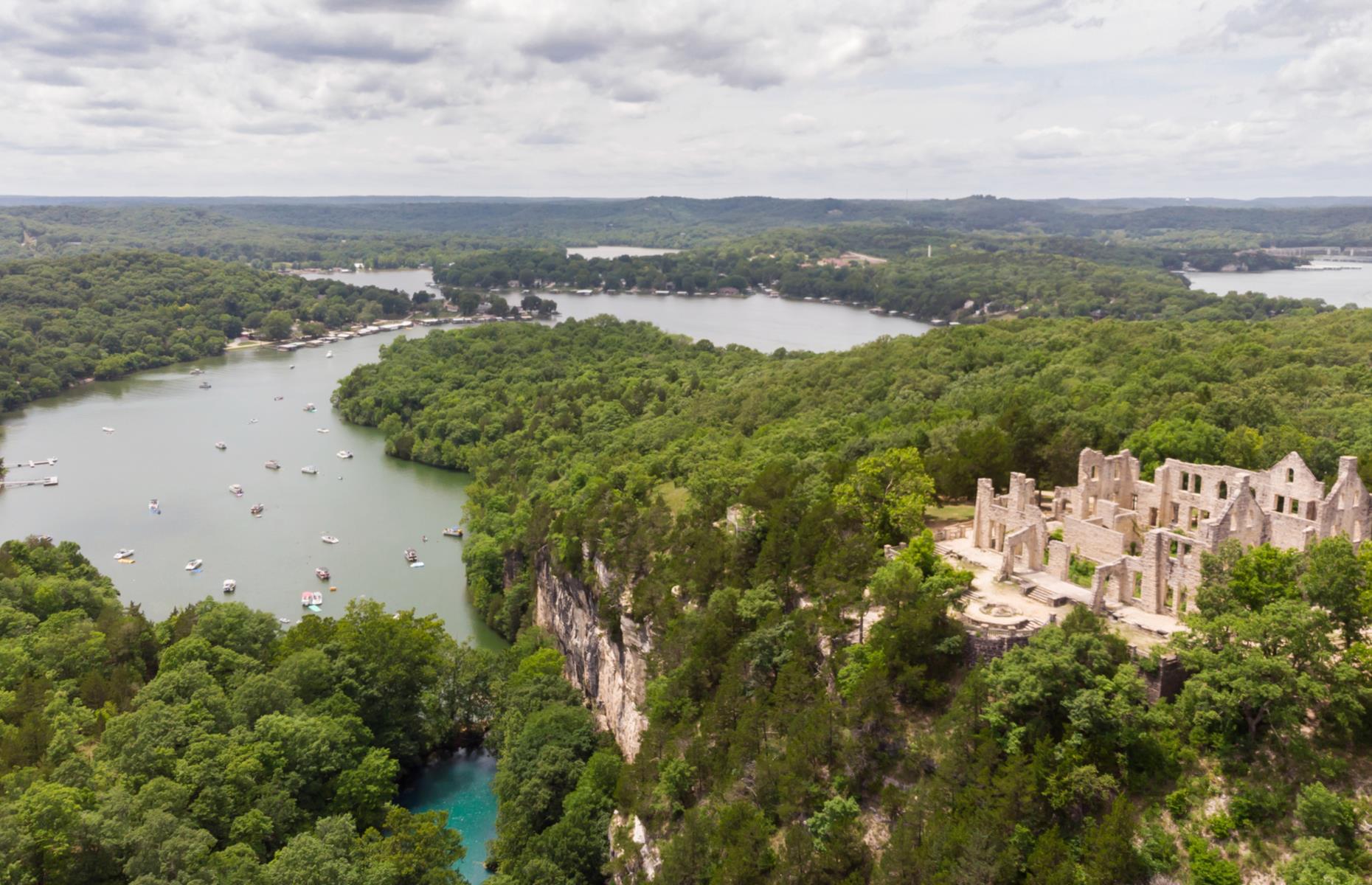 <p>Springfield is the starting point for this short getaway – here, <a href="https://fantasticcaverns.com/">Fantastic Caverns</a>, which offers cave tours via a jeep-drawn tram, is a hit with kids. In Camdenton, Missouri's backyard unfolds in all its glory. Ha Ha Tonka State Park (pictured) contains the incredible ruins of Ha Ha Tonka Castle (<a href="https://mostateparks.com/park/ha-ha-tonka-state-park">park capacity is being closely monitored</a> at this time), while the wiggling Lake of the Ozarks is a perfect spot for water sports.</p>