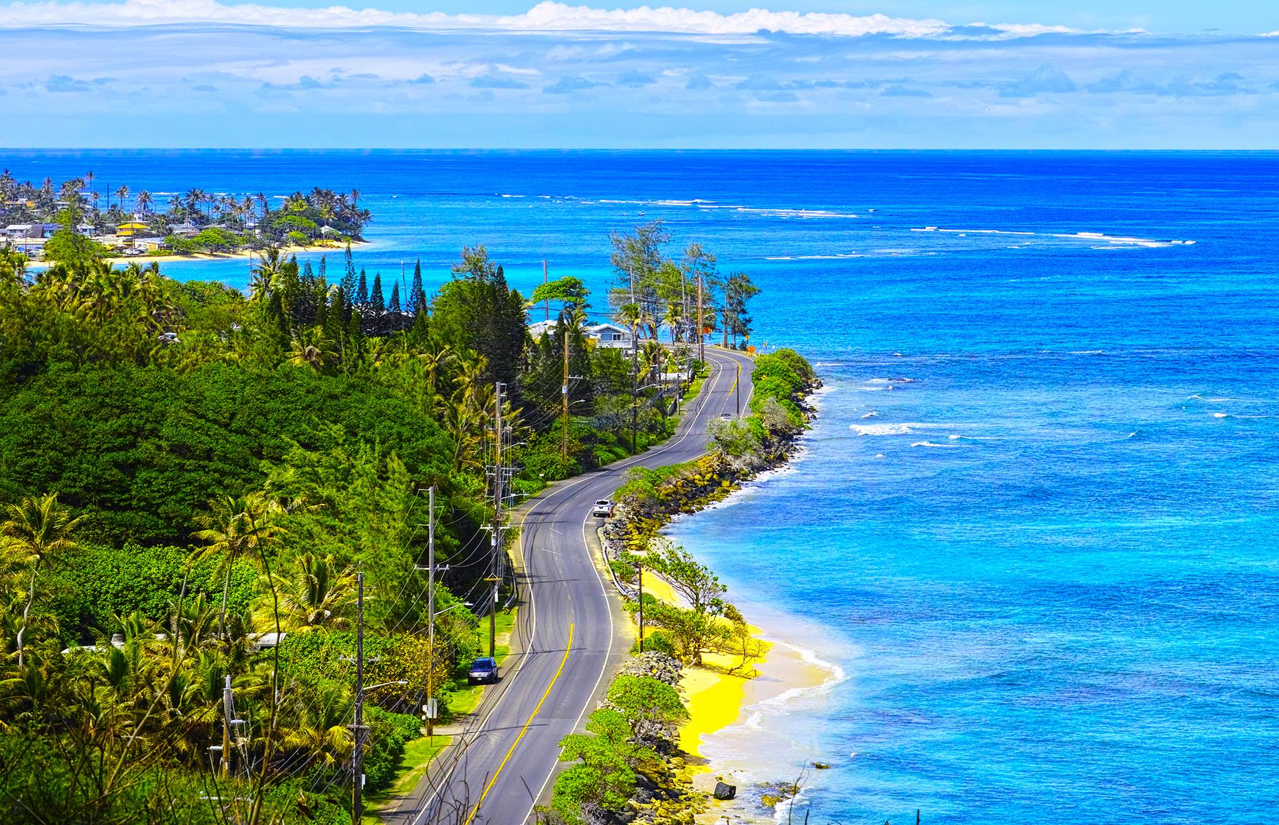 <p>When it comes to planning road trips, travelers often eschew Hawaii (not least because it’s the only state you can’t drive to). But there are still plenty of stunning routes to be enjoyed. A favorite is the Kamehameha Highway (pictured). This route takes adventurous road-trippers from buzzing Honolulu to the more remote beaches and towns of Hawaii’s North Shore. On this drive, the city of Pūpūkea is around 45 miles from the capital, and the trip involves just over an hour of driving time.</p>