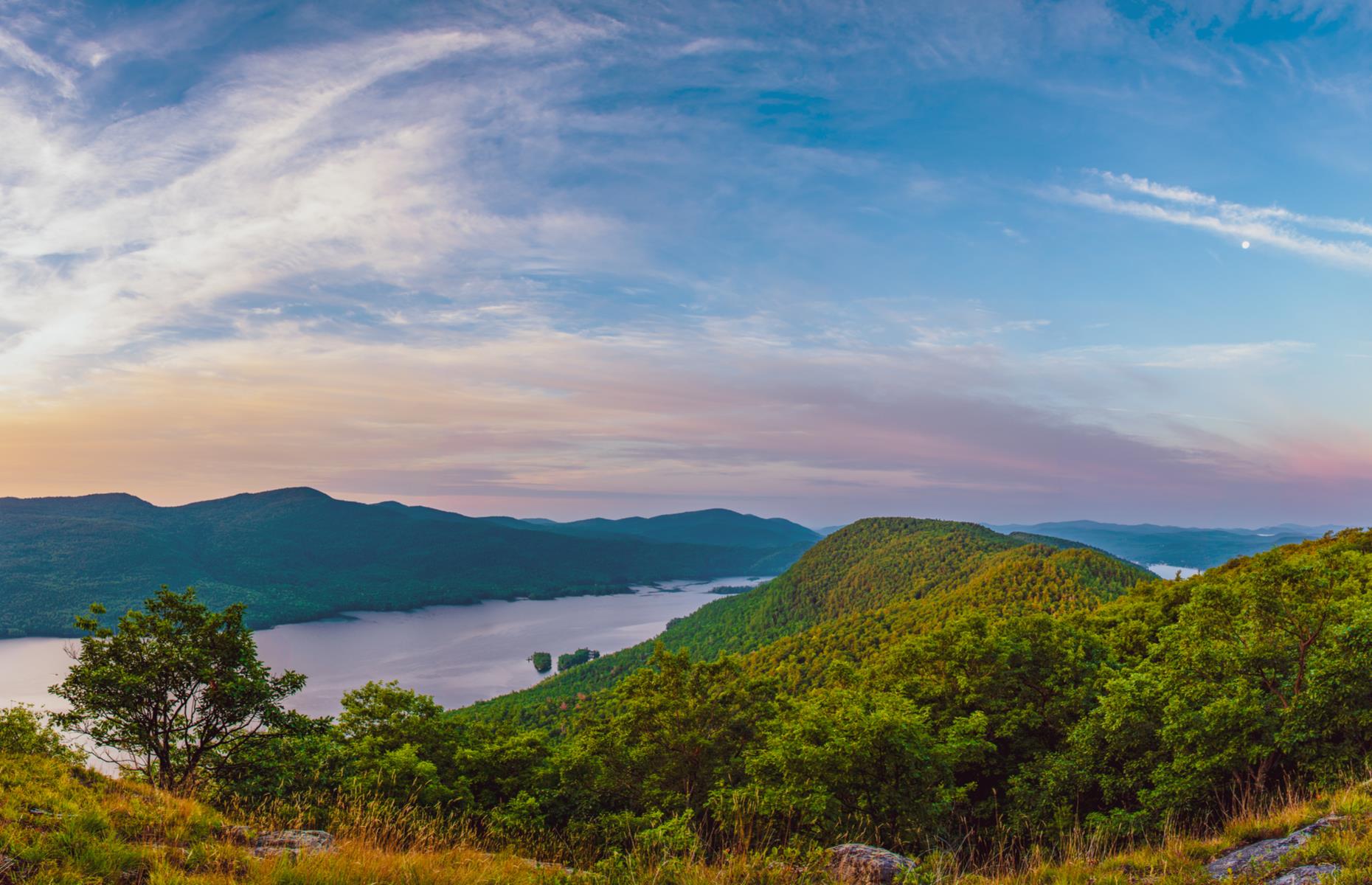 <p>Lake George, with its beaches and tasting rooms, has plenty of opportunity for kayaking and canoeing, plus a three-mile (5km) round-trip trail to Prospect Mountain. The town also leads out onto the scenic Route 9N. This breathtaking road loops some 32 miles (51km) around the edge of Lake George (pictured), granting amazing waterside views. <a href="https://www.loveexploring.com/galleries/94776/99-beautiful-things-we-love-about-america">Read on as we reveal 99 beautiful things we love about America</a>. </p>