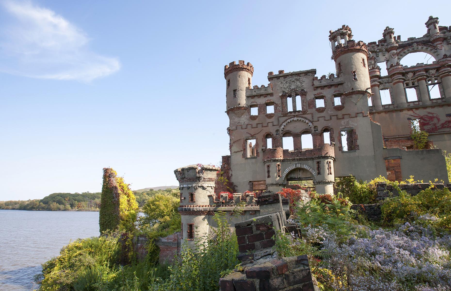 Slide 21 of 35: The lavish castle-style building was used for business purposes while the island was also home to a more humble residence where Bannerman lived with his family. However, construction of the castle was never actually completed. Bannerman's death in 1918 (as well as a series of damaging fires) meant that his vision for the castle would never truly be realized and Pollepel Island was eventually abandoned. Today the Bannerman Castle Trust maintains the site. Take a look at more stunning abandoned castles here.
