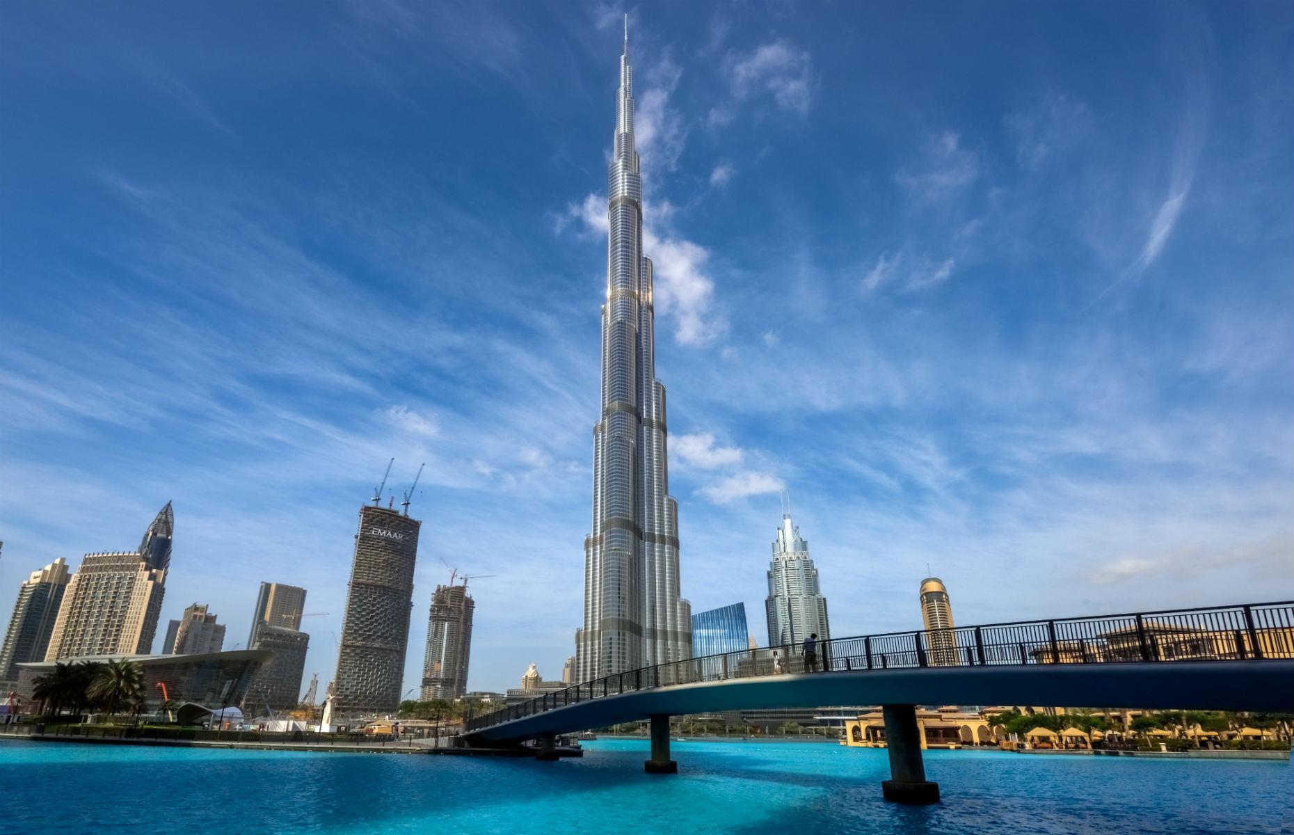 Slide 22 of 45: The towering Burj Khalifa, the world’s tallest building (for now), is a staggering 2,717 feet (828m) tall. It holds world records for not only being the tallest building in the world, but also the tallest man-made structure in the world, the tallest free-standing structure in the world, the highest outdoor observation deck in the world and more.