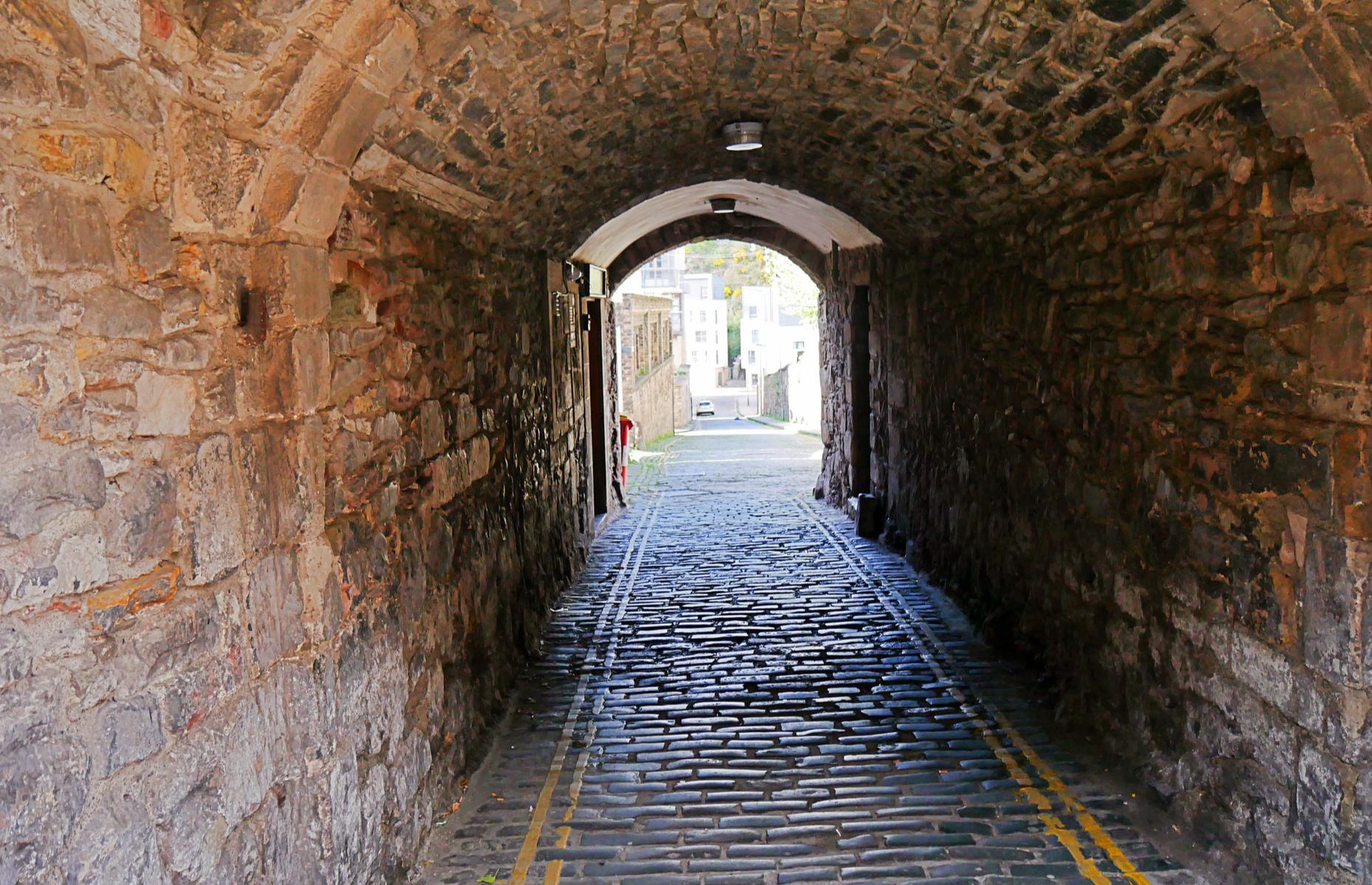 Slide 33 of 45: A number of the castle’s hidden secrets relate to its military past and present. For example there’s a network of tunnels and caves below Edinburgh whose purpose is shrouded in legends and stories. One tunnel constructed in the 1980s allows military vehicles to enter the castle without disrupting tourist visits.