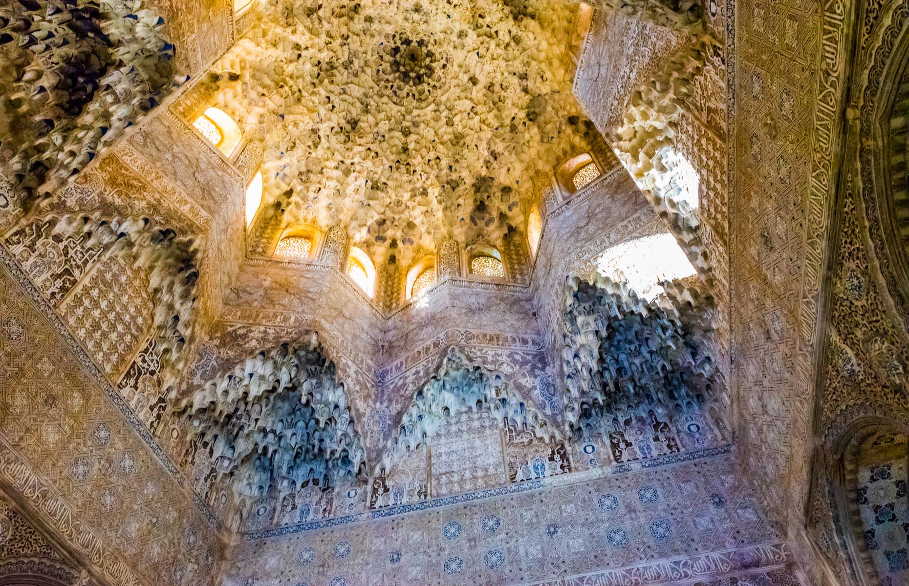 Slide 17 of 33: The ethereal ceiling of the Alhambra’s Hall of the Two Sisters is a definite highlight of Granada’s Moorish masterpiece. Look up at your peril. You won’t want to look down in a hurry: the wonderful dome displays one of the world's finest examples of intricate mocárabe or stalactite work, ornamental design typical of Islamic architecture. Small windows allow light to filter through and spill dreamily down the exquisite dome.