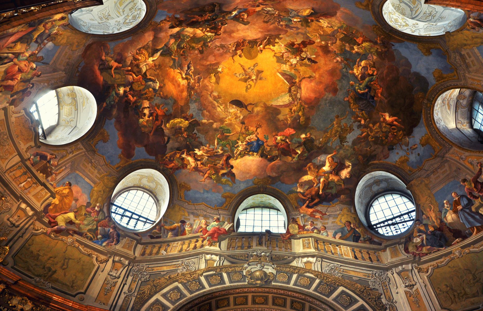 Slide 26 of 33: As you'd imagine, the spectacular State Hall of the biggest baroque library in Europe is a sight to behold. The one-time Court Library is 260-foot-long (79m) and crammed with more than 200,000 precious volumes. It's also crowned by a splendid baroque dome adorned with frescoes by court painter Daniel Gran. It was built under the orders of Emperor Charles VI as a private wing of the Hofburg imperial residence in the 18th century. Keep an eye out for the huge Venetian baroque globes too. 