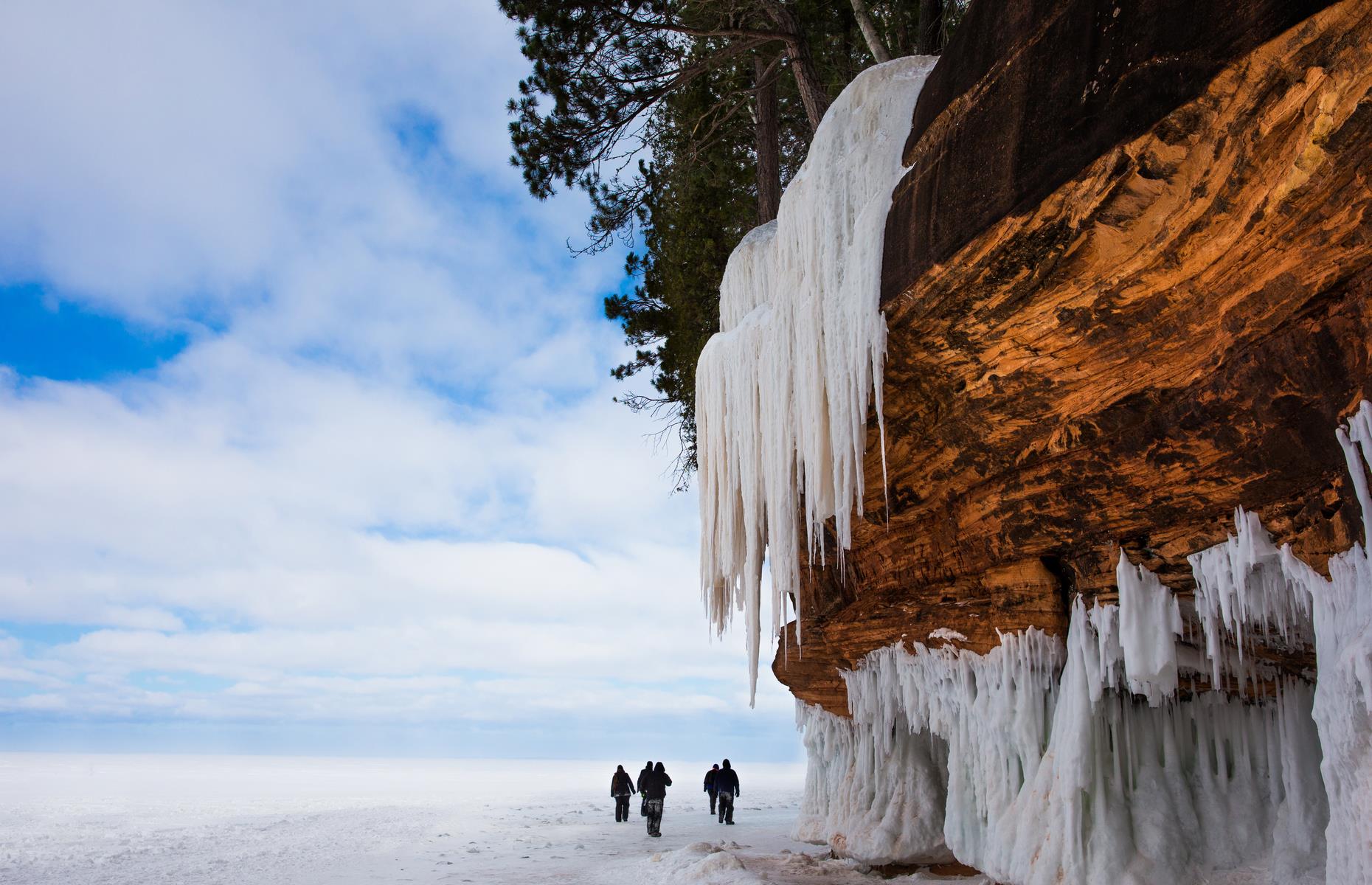 <p>Apostle Islands National Lakeshore boasts all manner of natural wonders, from craggy rock formations and wind-battered cliffs to sandy strands – but none are more intriguing than the ice caves that form here each winter. The caves are accessible from a trail beginning at the Meyers Beach parking area and winding downwards (you'll walk up to six miles (9.6km) in total depending on how many of the caves you take in). Their opening times are entirely dependent on weather conditions and of course COVID-19 so <a href="https://www.nps.gov/apis/mainland-caves-winter.htm">check the NPS website</a> if you're planning a visit. </p>