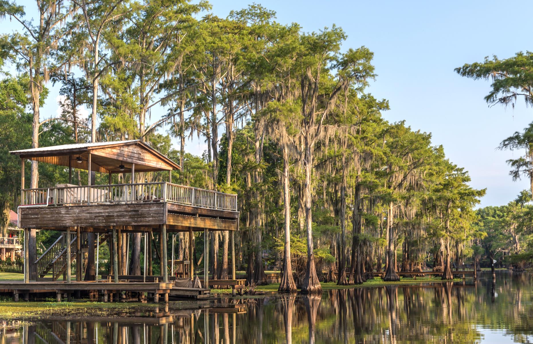 <p>Texas' Caddo Lake could be straight from a fairy tale, its elegant cypress trees reflected in the water's ripple-less skin. The Span­ish moss draped across the branches make the waterways all the more ethereal. Take to the lake's 26,810-acre expanse, and paddle between the moss-cloaked trees, before jumping back on land to explore the depths of the forestland on foot. Overnight at one of the historic cabins perched on the lakeside. Now read more about <a href="https://www.loveexploring.com/galleries/87438/americas-most-stunning-lakes?page=1">America's most stunning lakes</a>. </p>